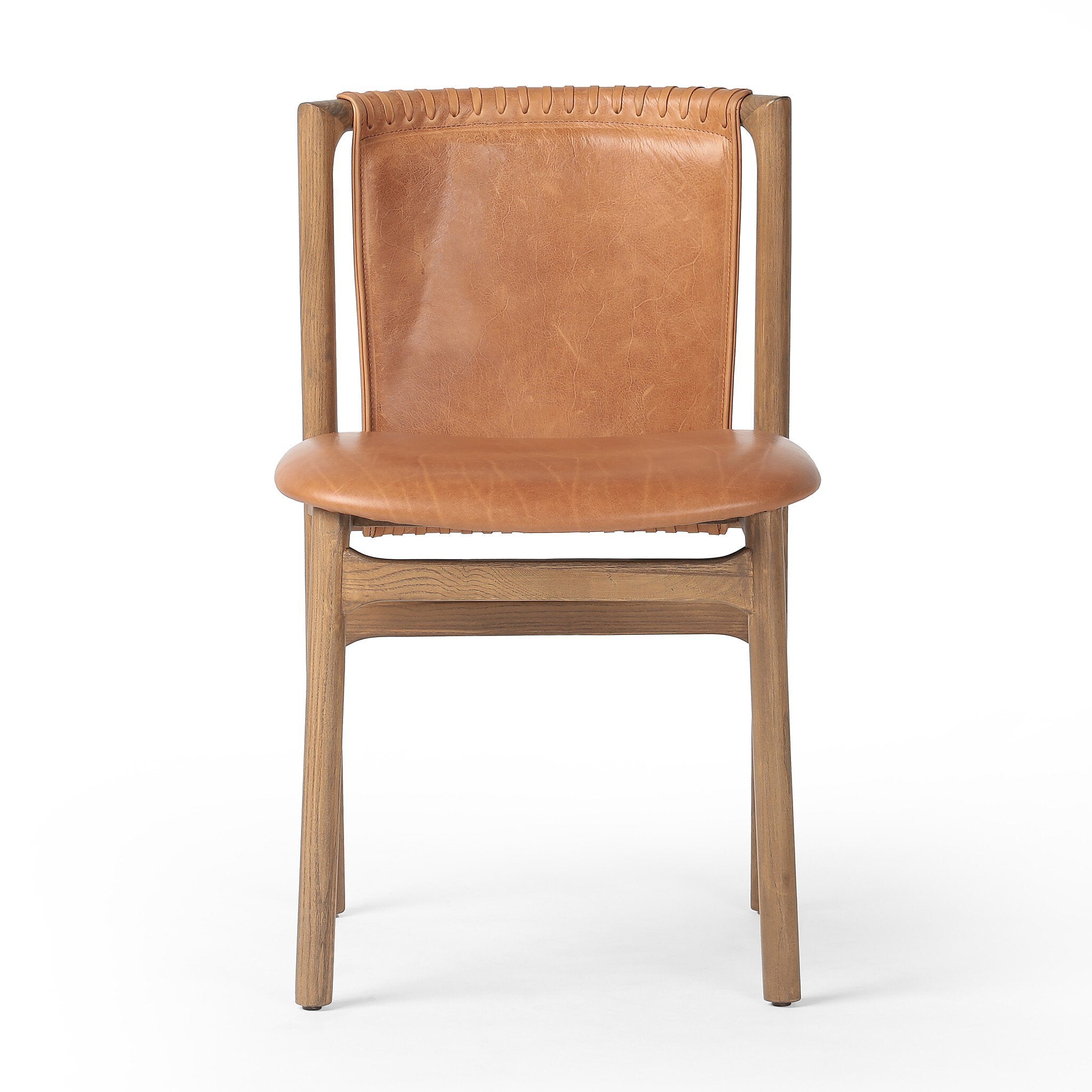 Tobacco-grain leather chair with leather wrap detailing on a wooden frame on a white background.