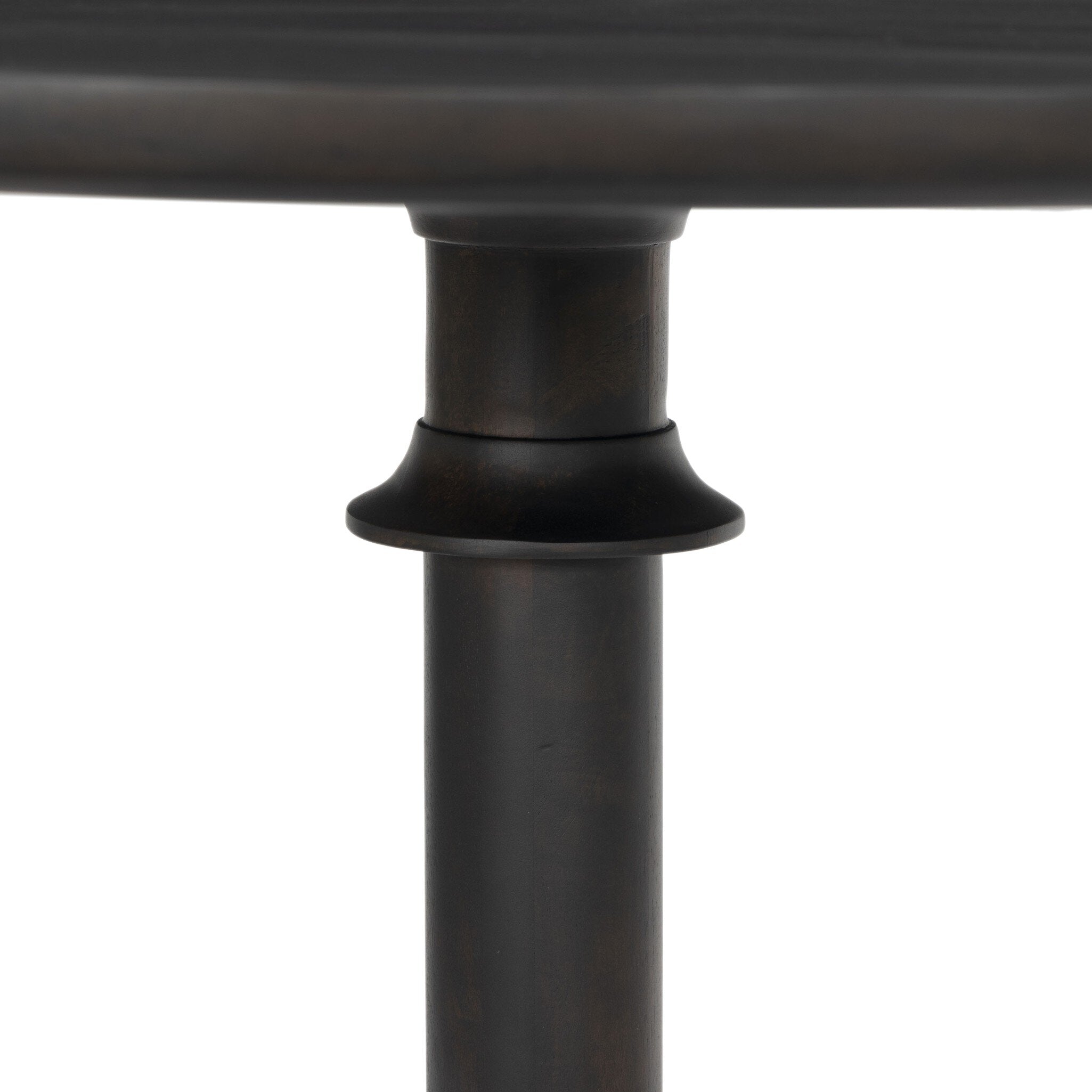 Close up of the turn detailing on the table base. 