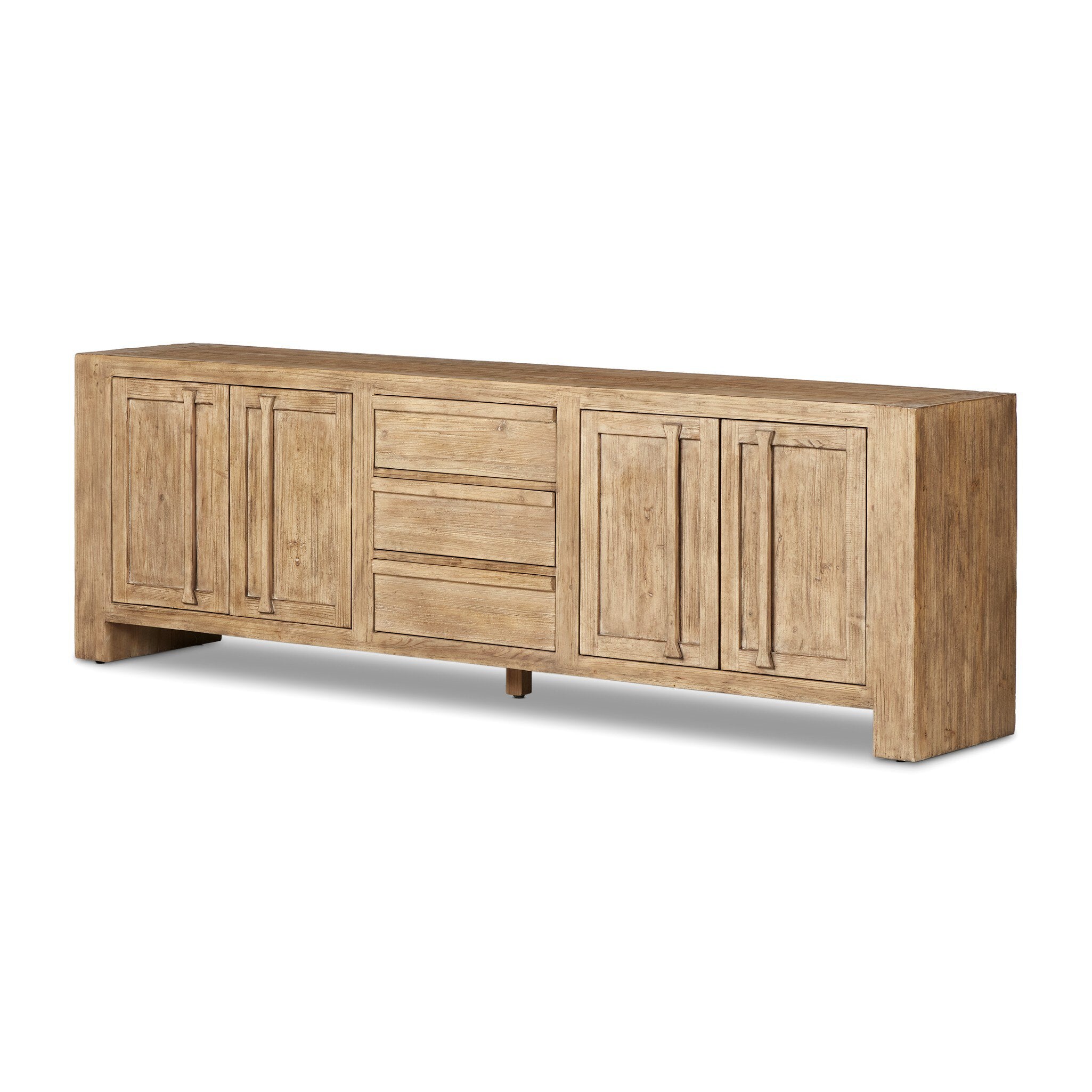 Wooden sideboard with four doors and three drawers in the center on a white background.