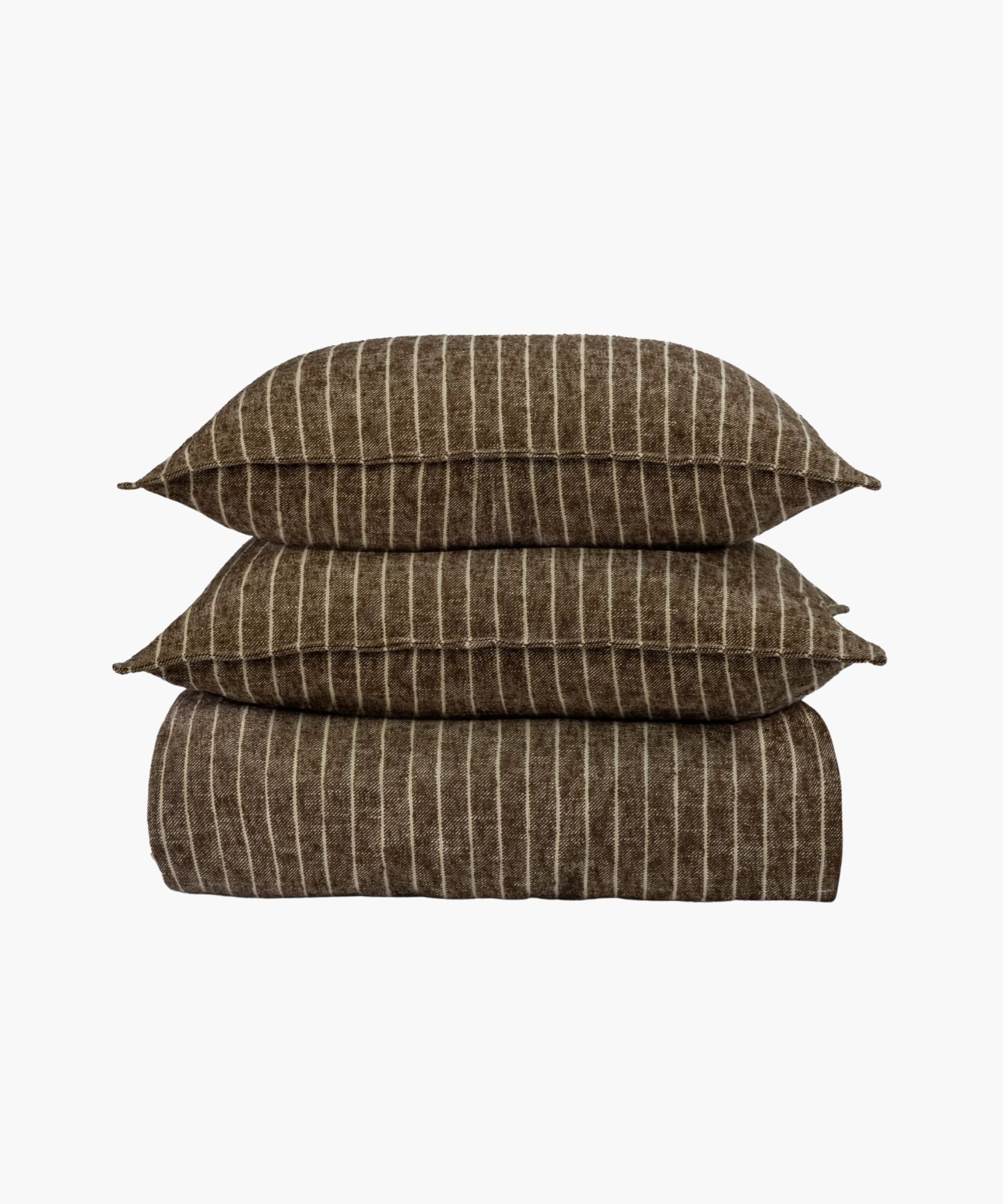 Stacked view of Bruno Duvet Cover with matching shams in a rich brown pinstripe pattern, displaying the boucle texture and tailored edges.