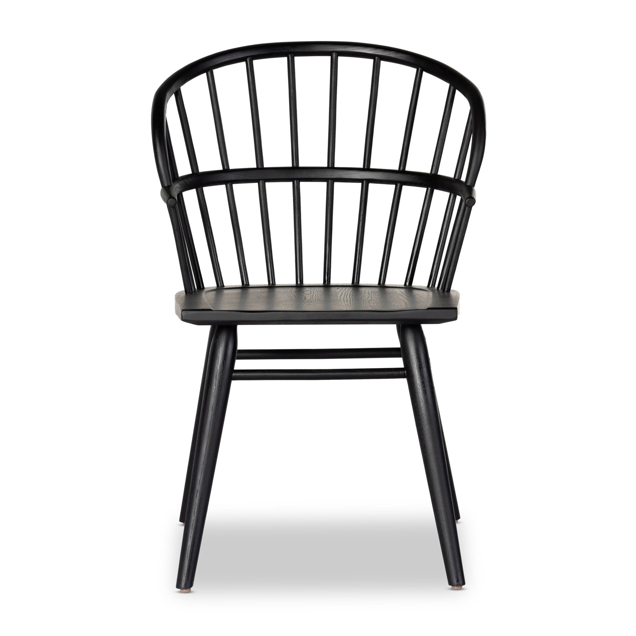 Black dining chair with a minimalist design on a white background.