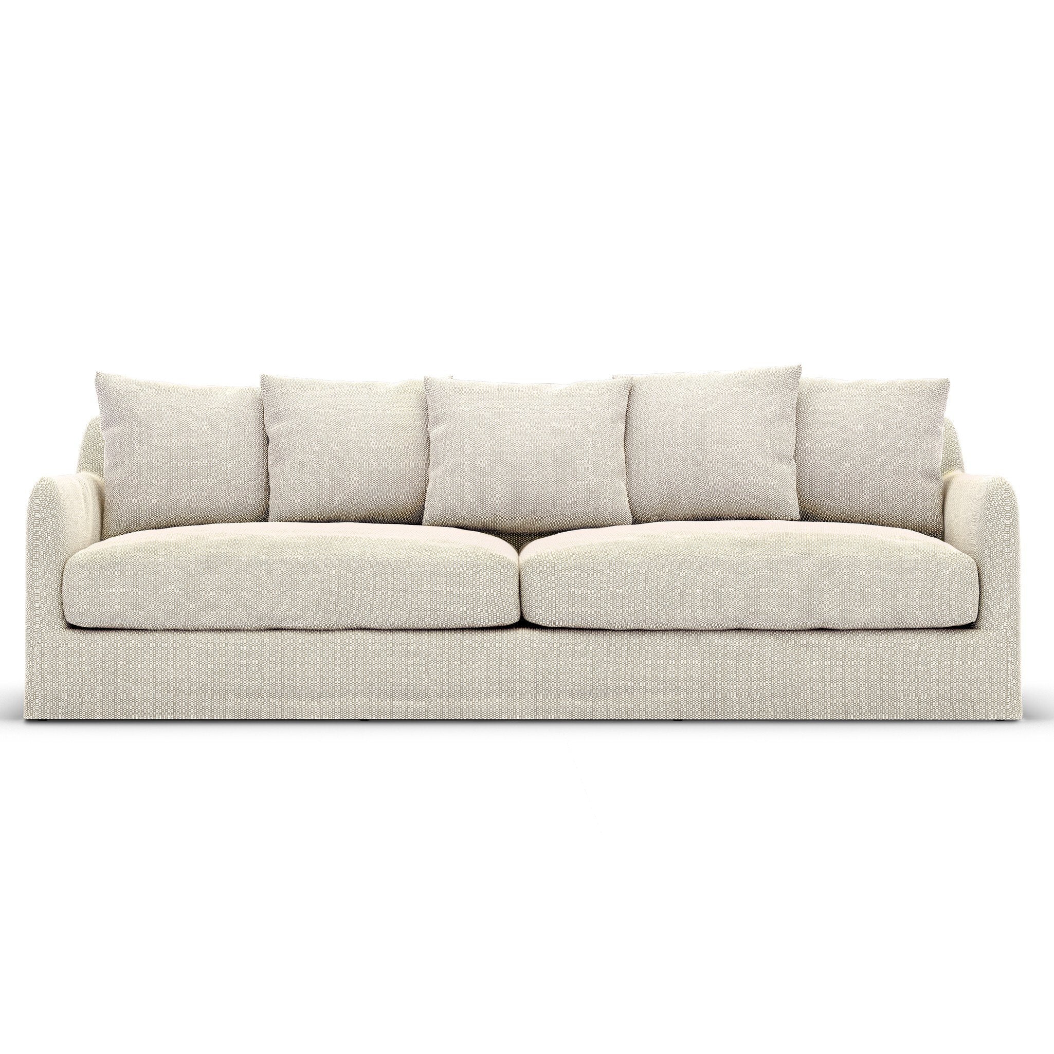 Sand colored slipcover outdoor sofa on a white background.