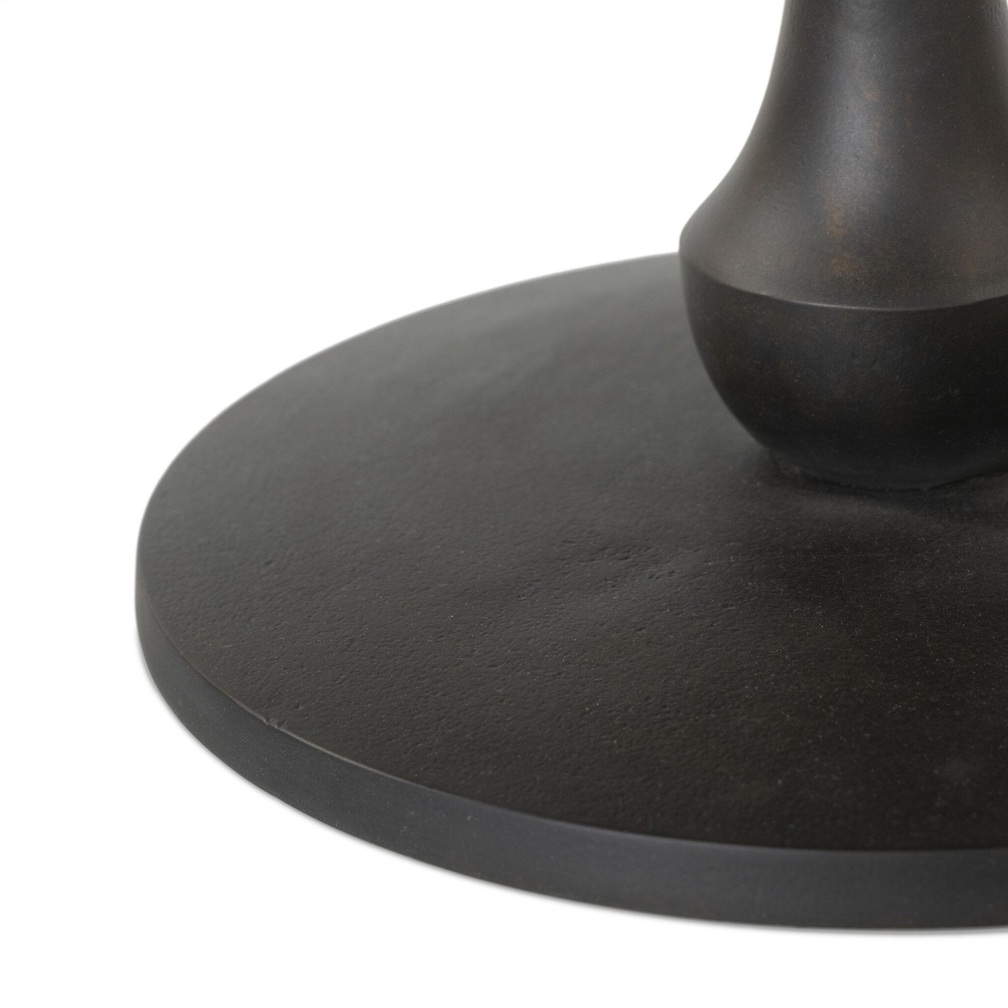 Close up picture of the geometric design on the pedestal base for the end table. 