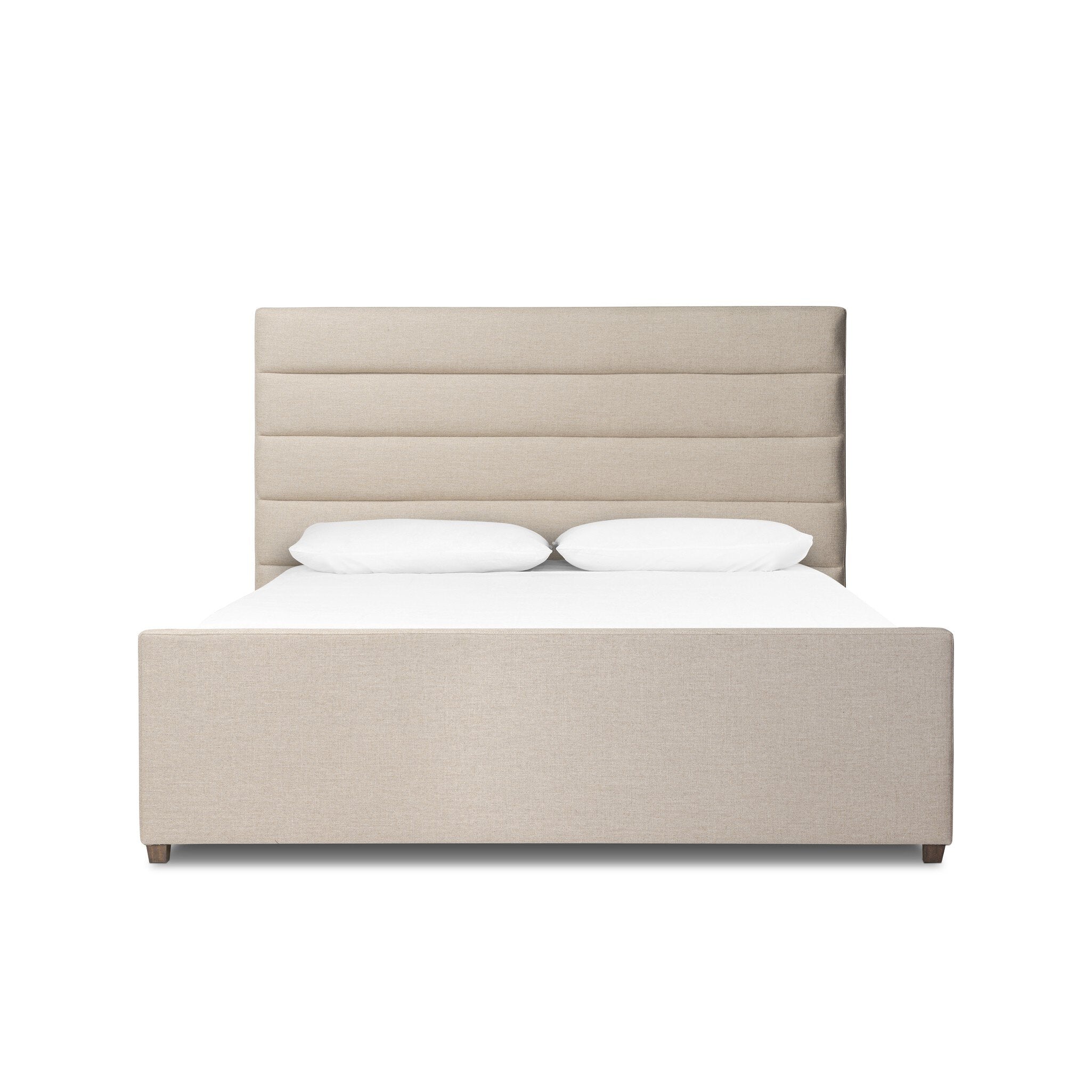 Taupe upholstered bed with horizontal channeling on the headboard and white bedding on a white background.