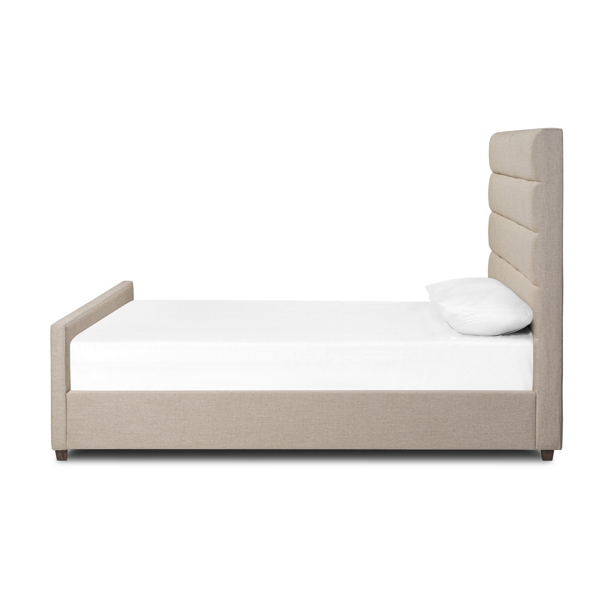 Taupe upholstered bed with horizontal channeling on the headboard and white bedding on a white background.