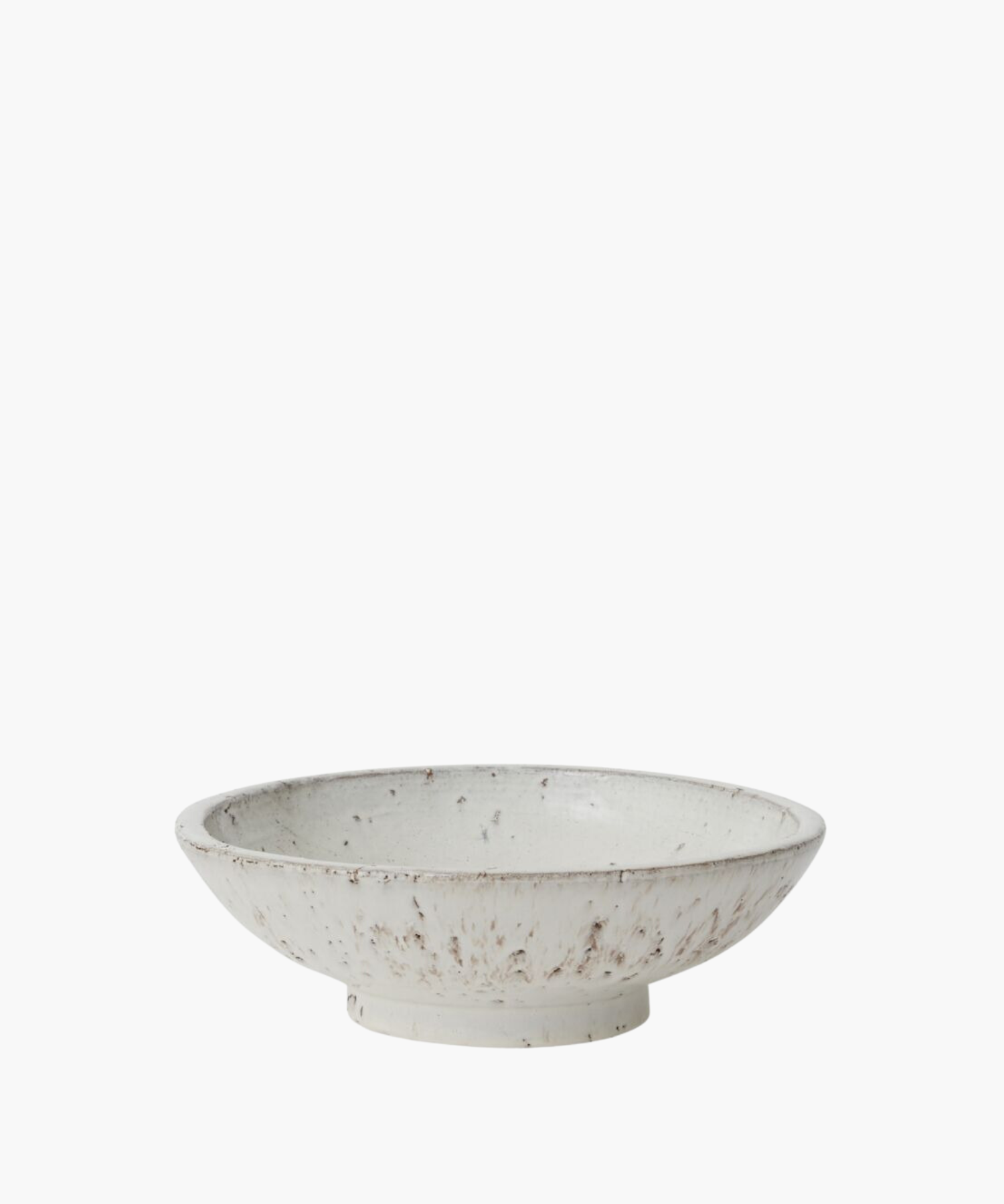 A rustic ceramic bowl with a wide, shallow design, featuring a white glaze speckled with earthy brown tones. The handcrafted look conveys a cozy, artisanal feel.