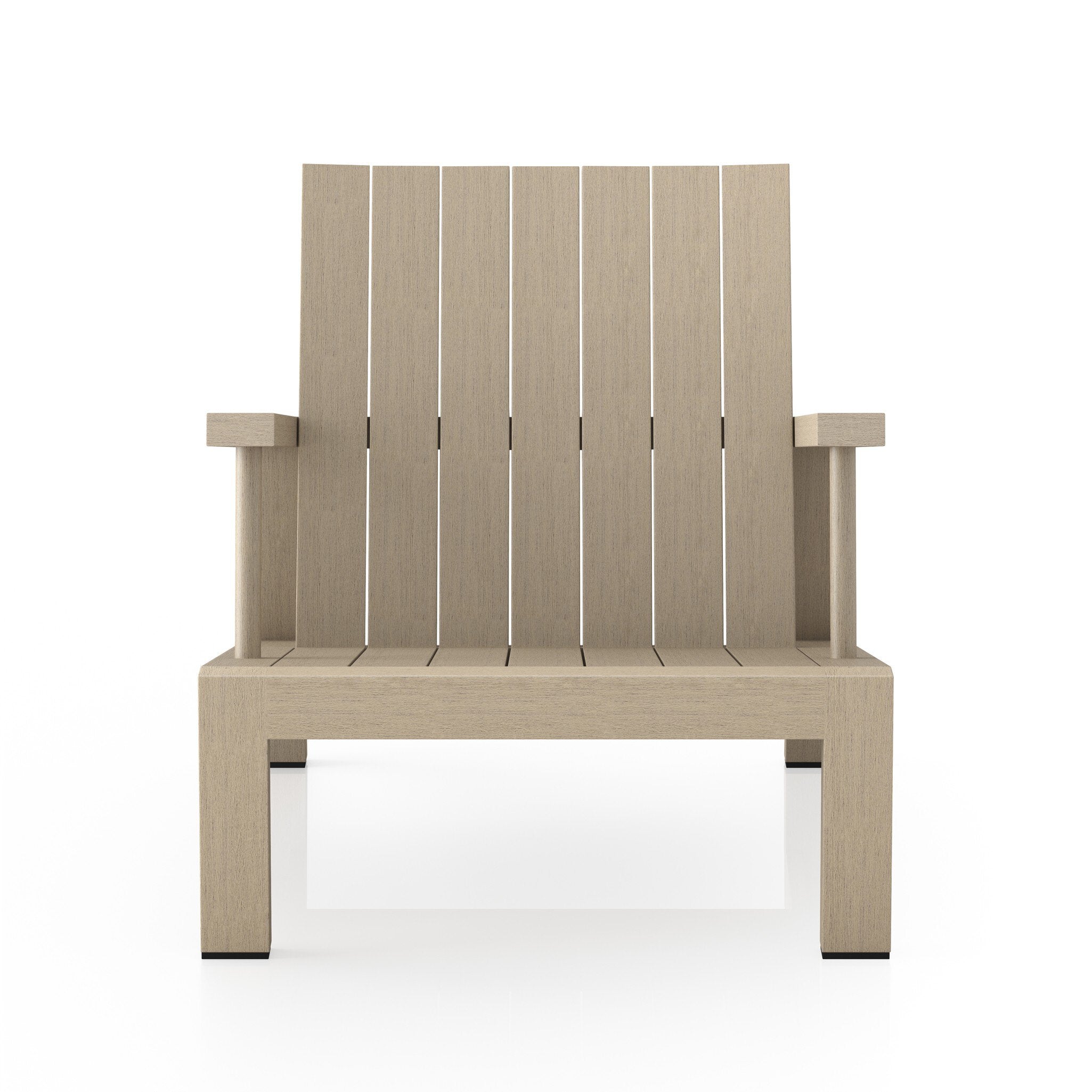 An Adirondack inspired outdoor chair made of teak with a wide angled frame with linear lines.