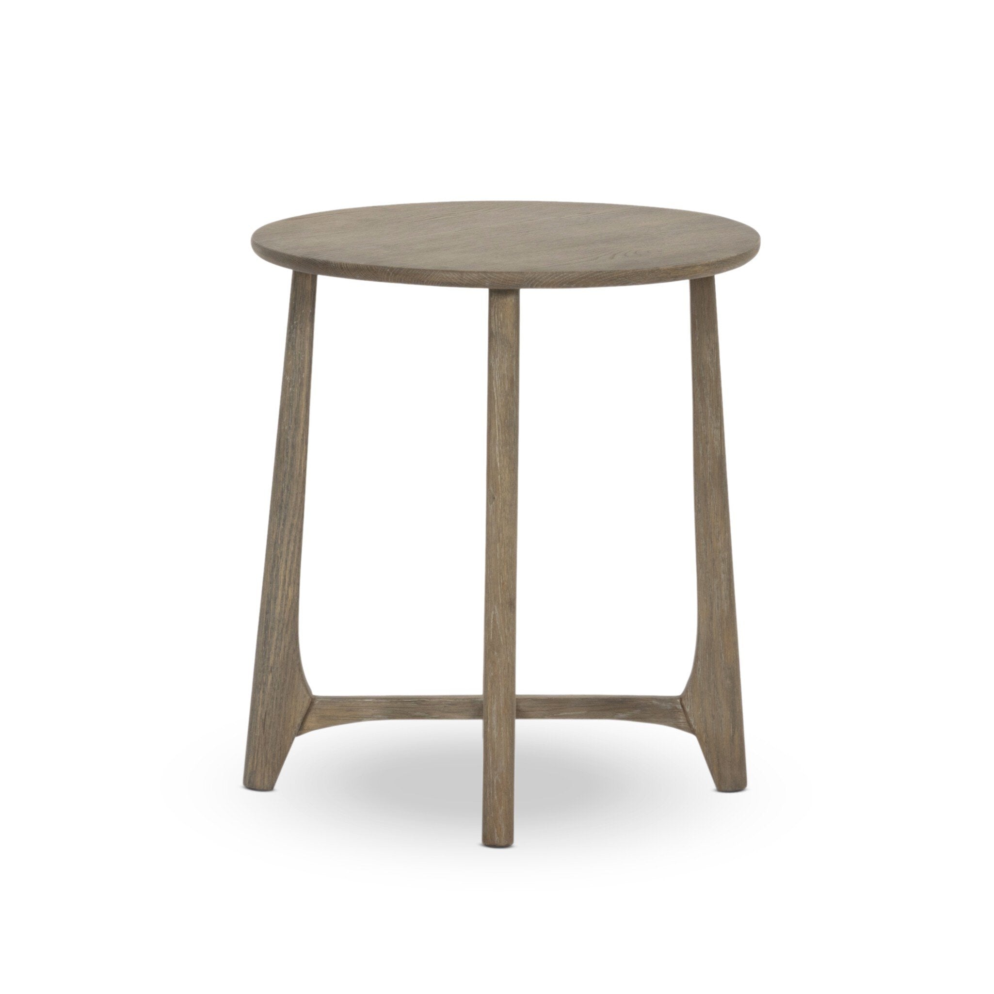 Simple oak round side table on a white background.