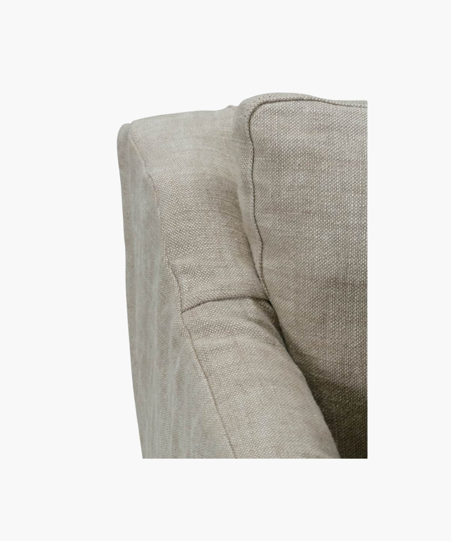 Close up of a beige sofa on a white background.