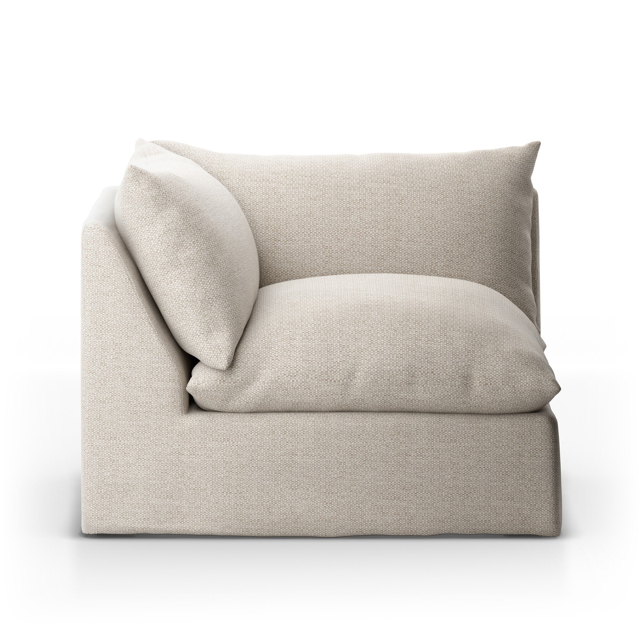 The corner section of a beige slipcover outdoor sofa on a white background.