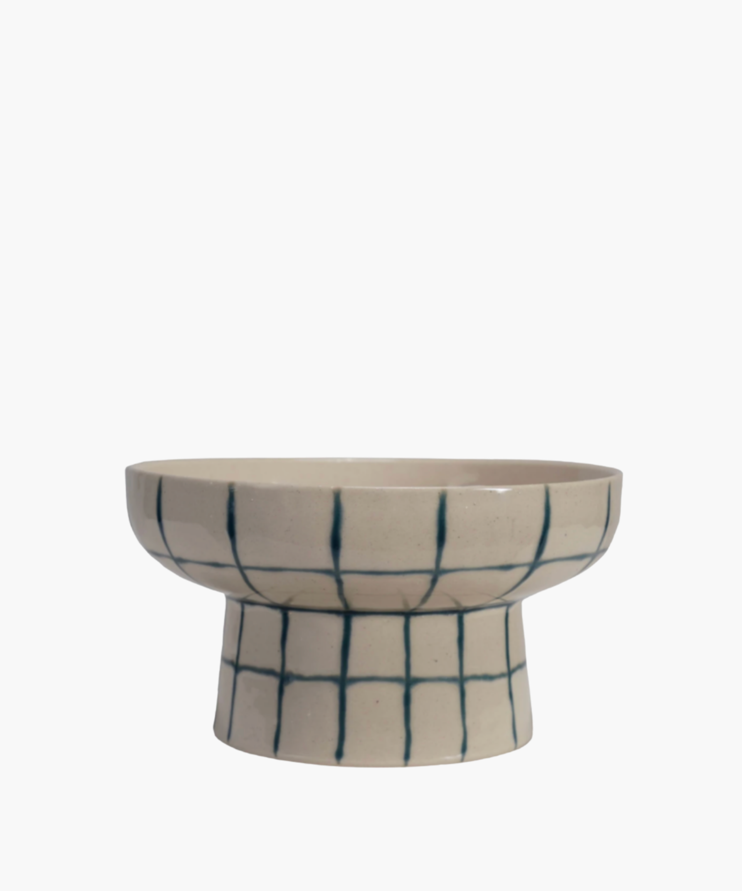 A beige ceramic pedestal bowl with a wide rim, featuring a blue grid pattern. The design is simple and modern, conveying a minimalist aesthetic.
