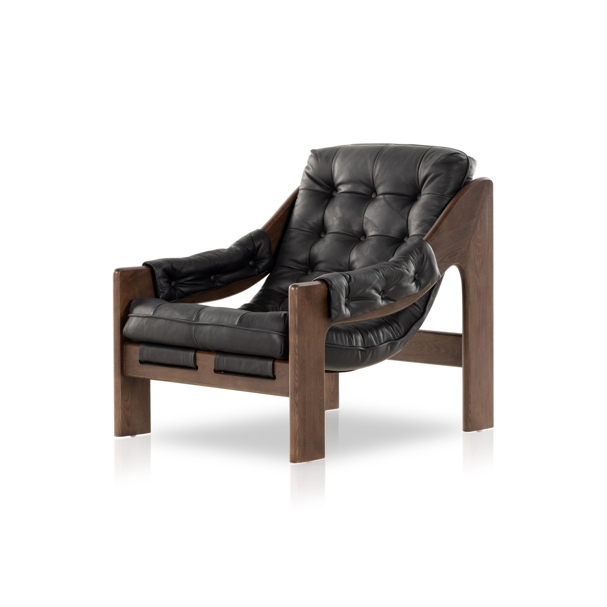 Tufted black leather sling style armchair with wooden frame on a white background.