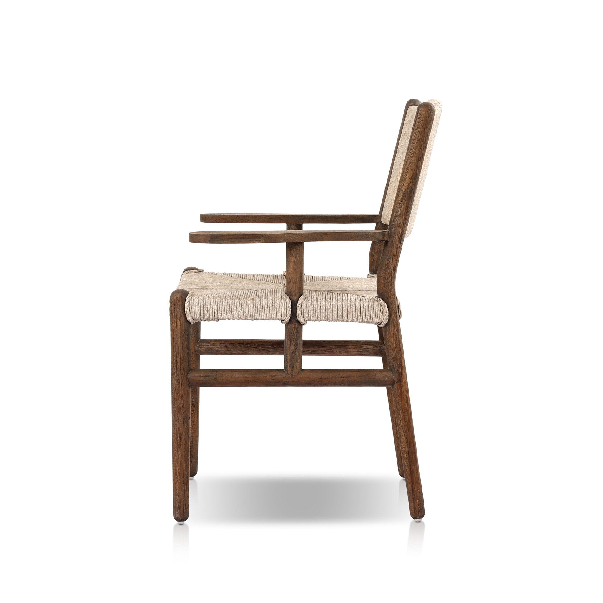 Side profile of a shaker style outdoor dining armchair with a dark brown wood frame and light brown woven seat and back on a white background. 
