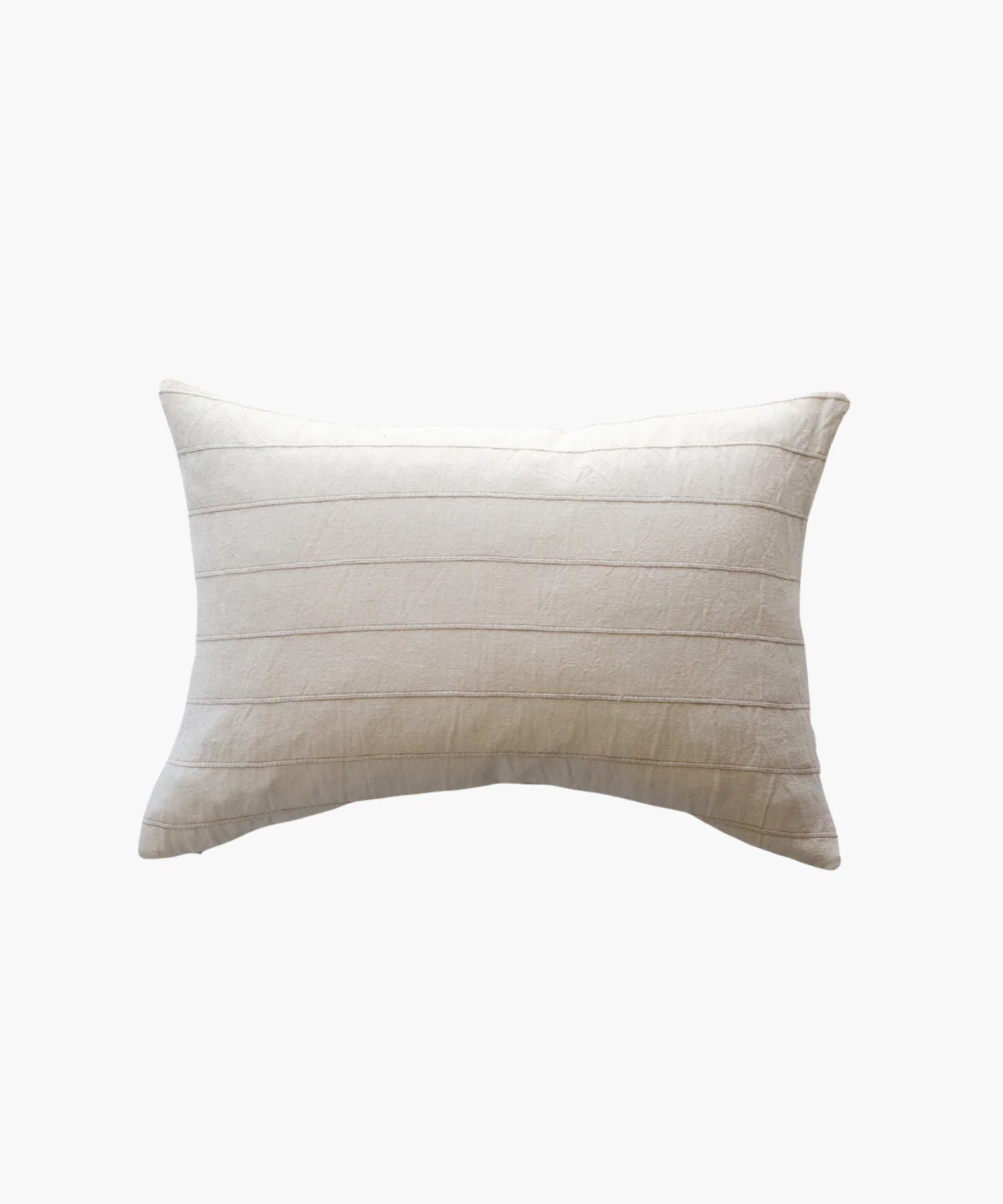 Lumbar beige pillow with pleated texture on a white background