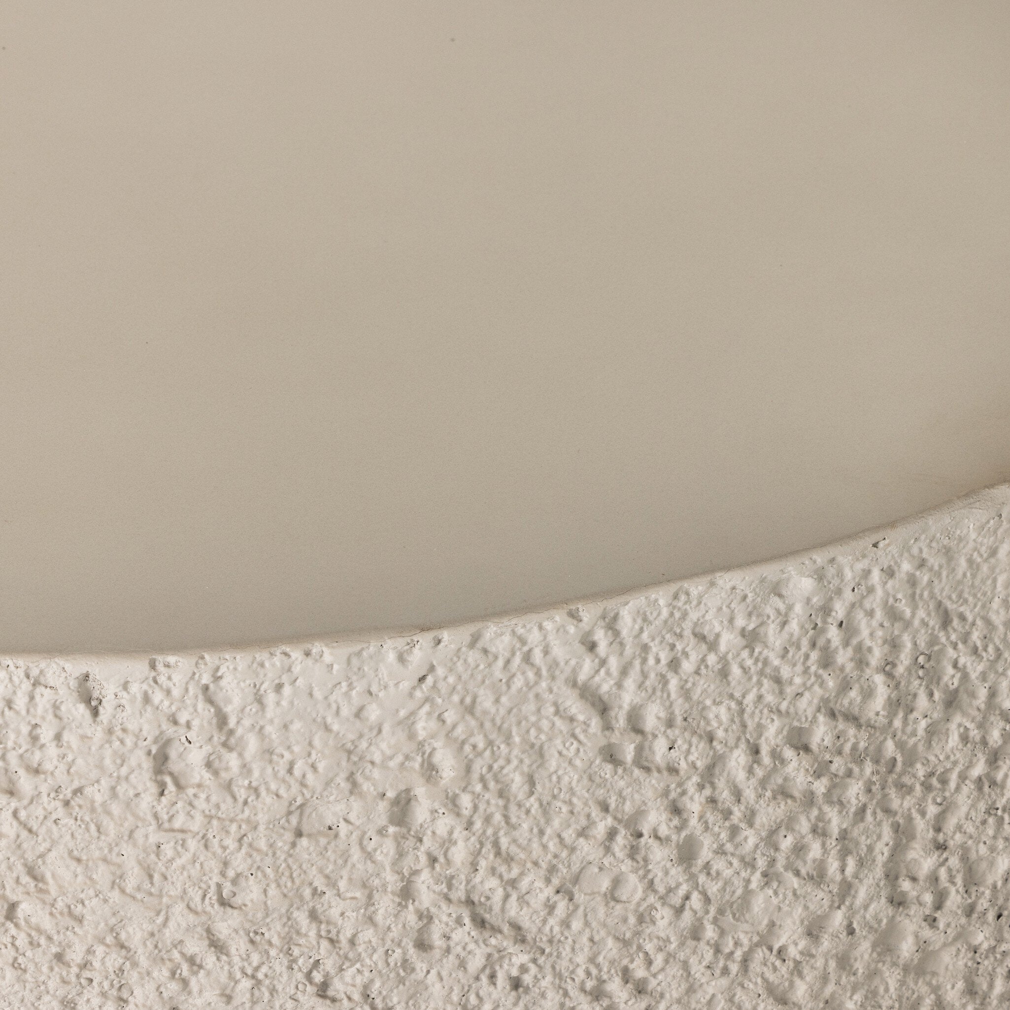 Close up of the pumice concrete coffee table with a smooth top. 