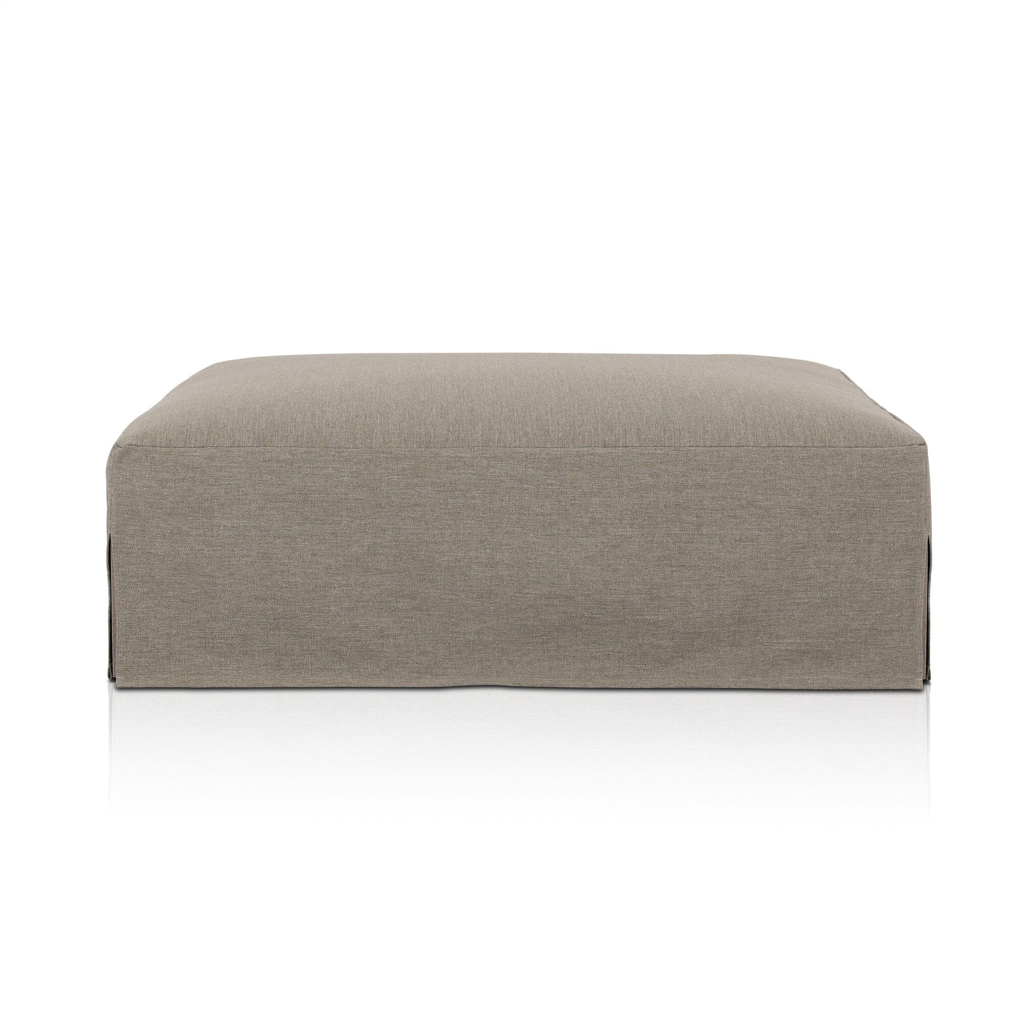 Slipcover gray outdoor ottoman on a white background.