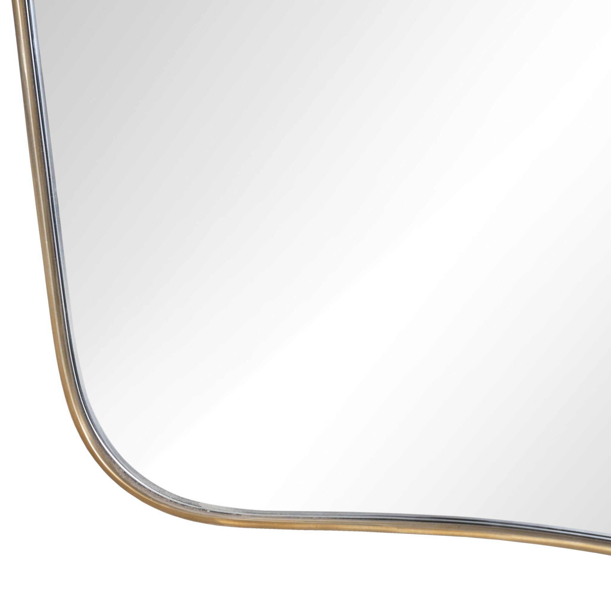 Close up of a decorative wall mirror with a gold frame on a white background.
