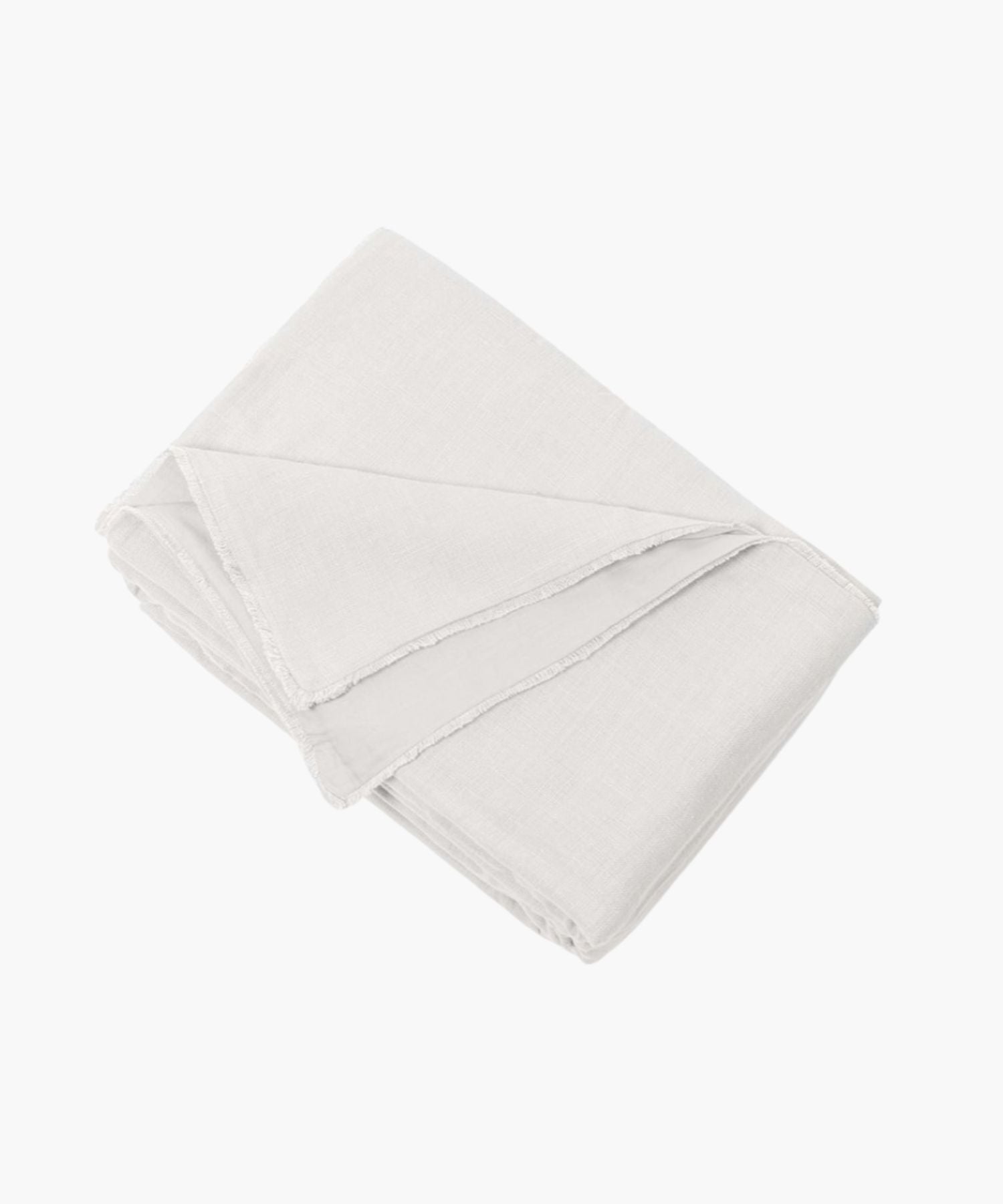 Neatly folded ivory linen duvet cover on a white background showing texture and soft tonal color. 
