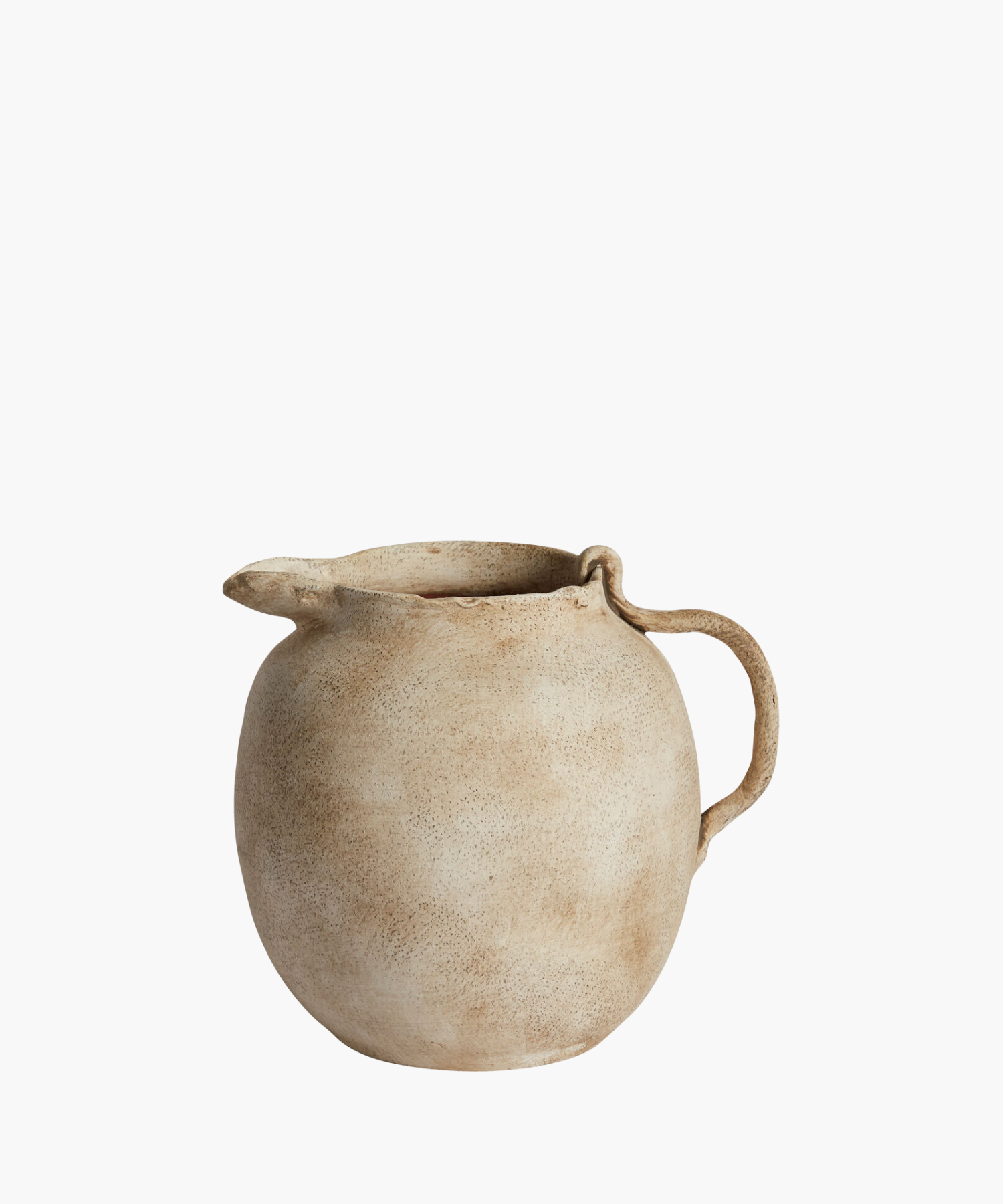 Rustic beige ceramic pitcher with a rounded body, textured surface, and curved handle. The design evokes a vintage, handcrafted feel.