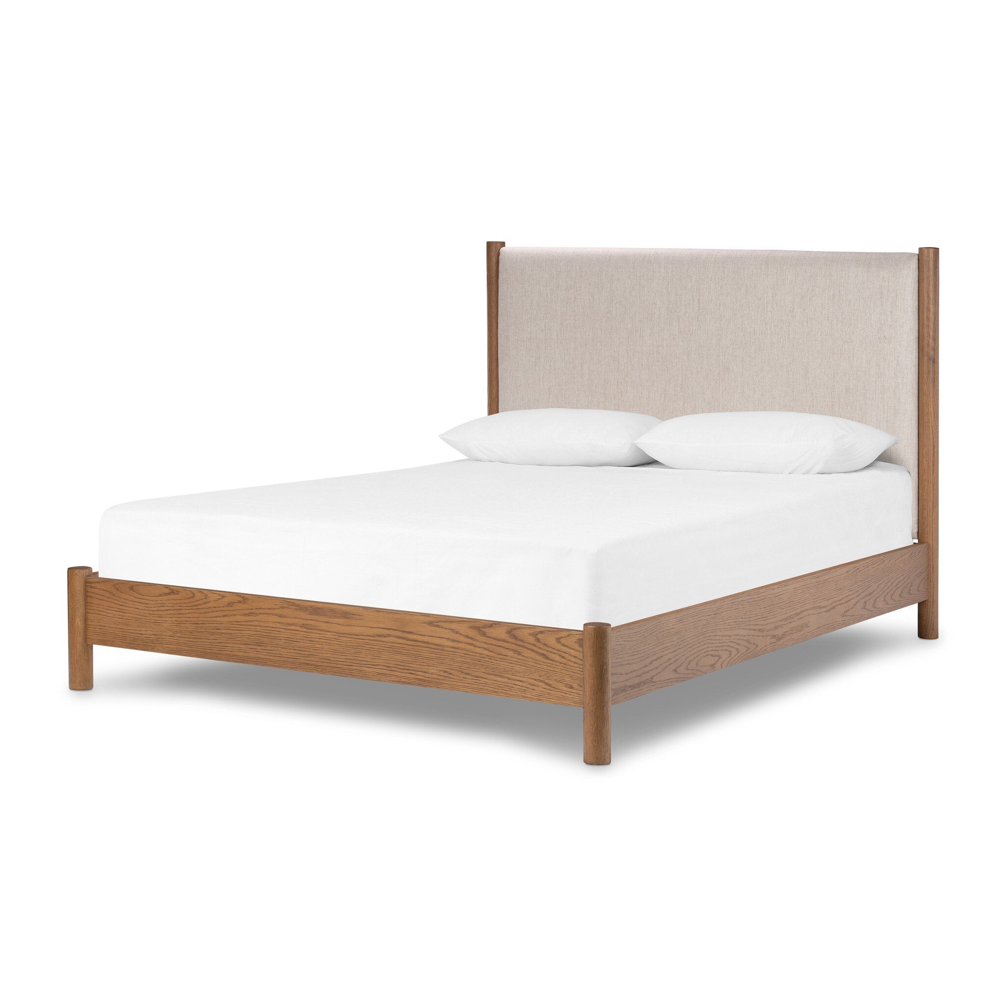 Wooden bed with upholstered headboard and white bedding on a white background