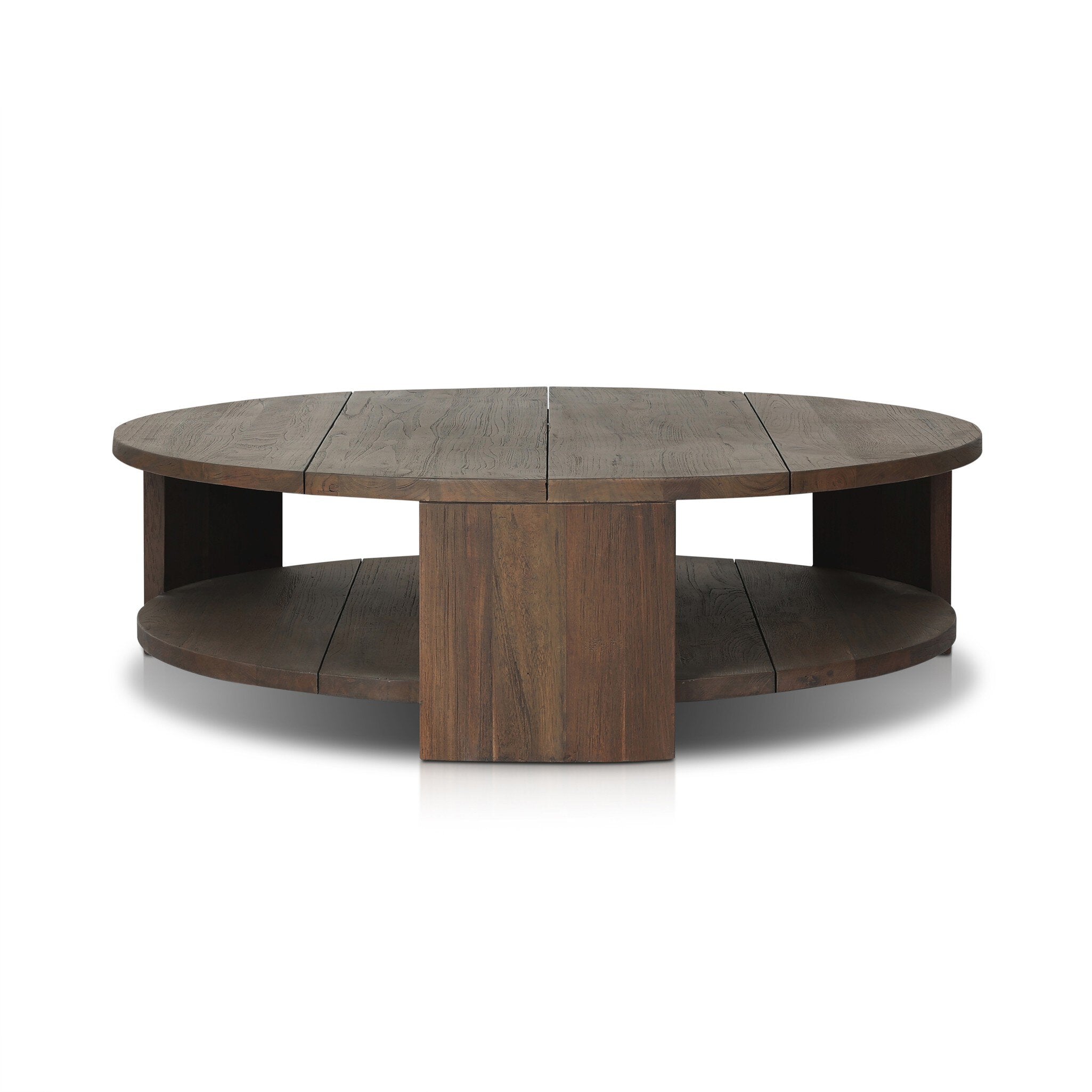 A two tiered round coffee table made from reclaimed wood with chunky legs and a brown finish.