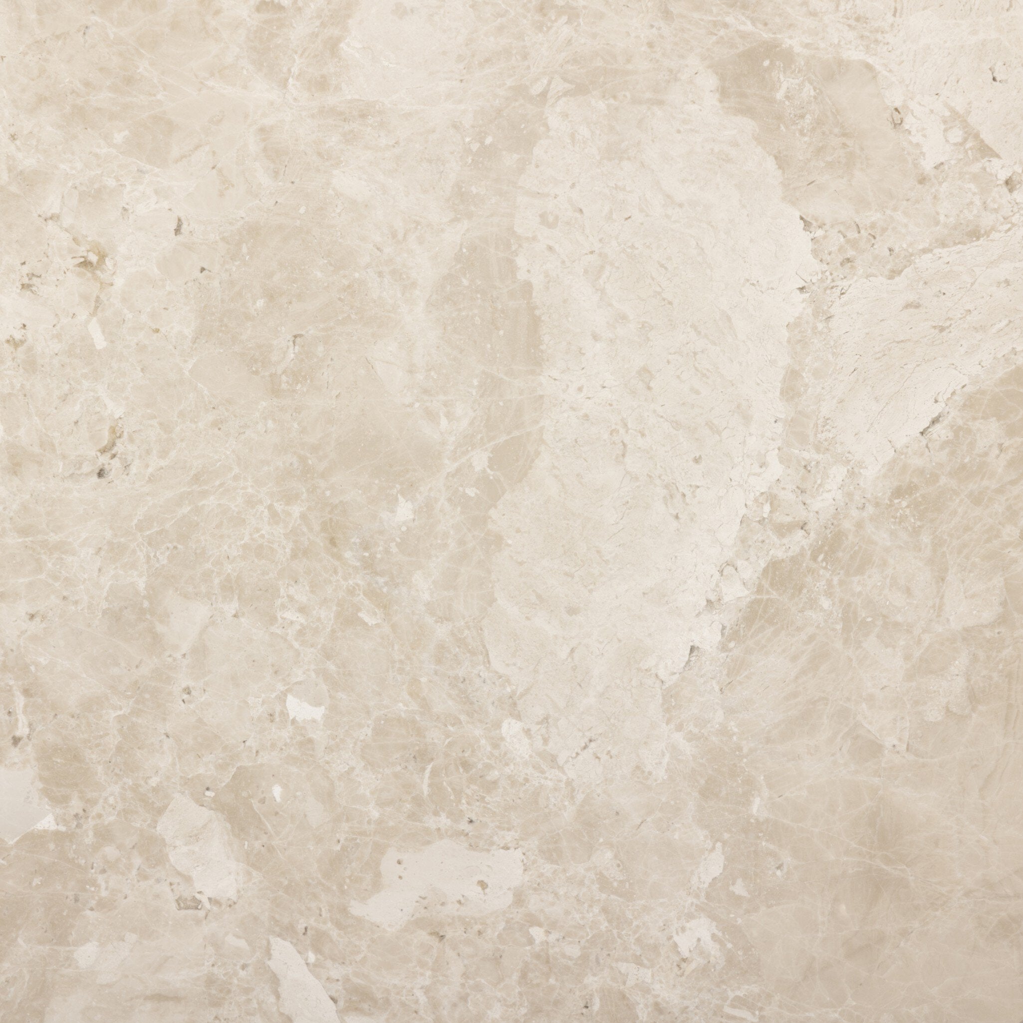 Close up picture of one of the marble shelves showing the beige marble color and pattern. 