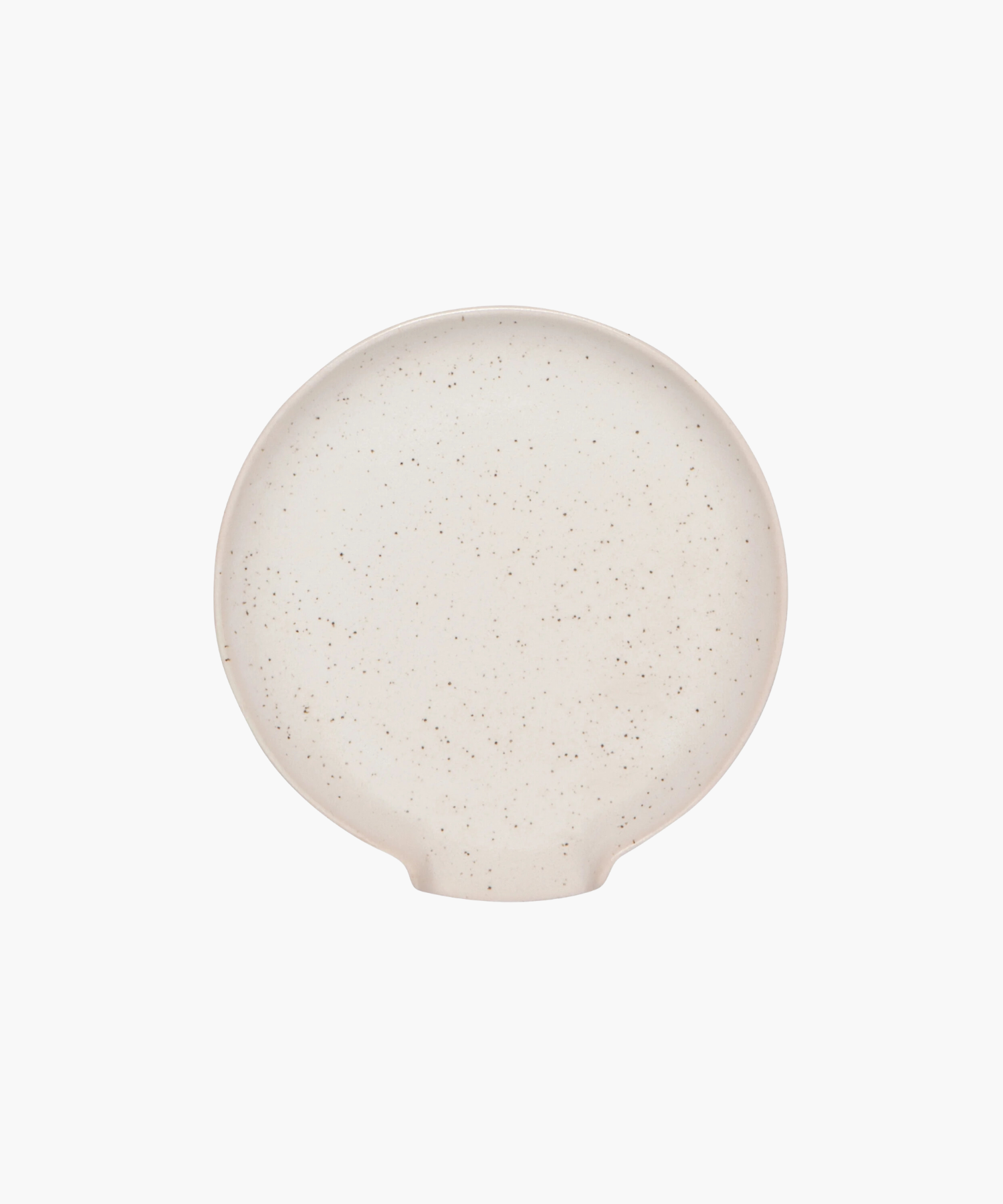 Overhead view of a round, beige ceramic spoon rest with a slightly raised rim and subtle speckled texture on a white background. The tone is simple and minimalist.