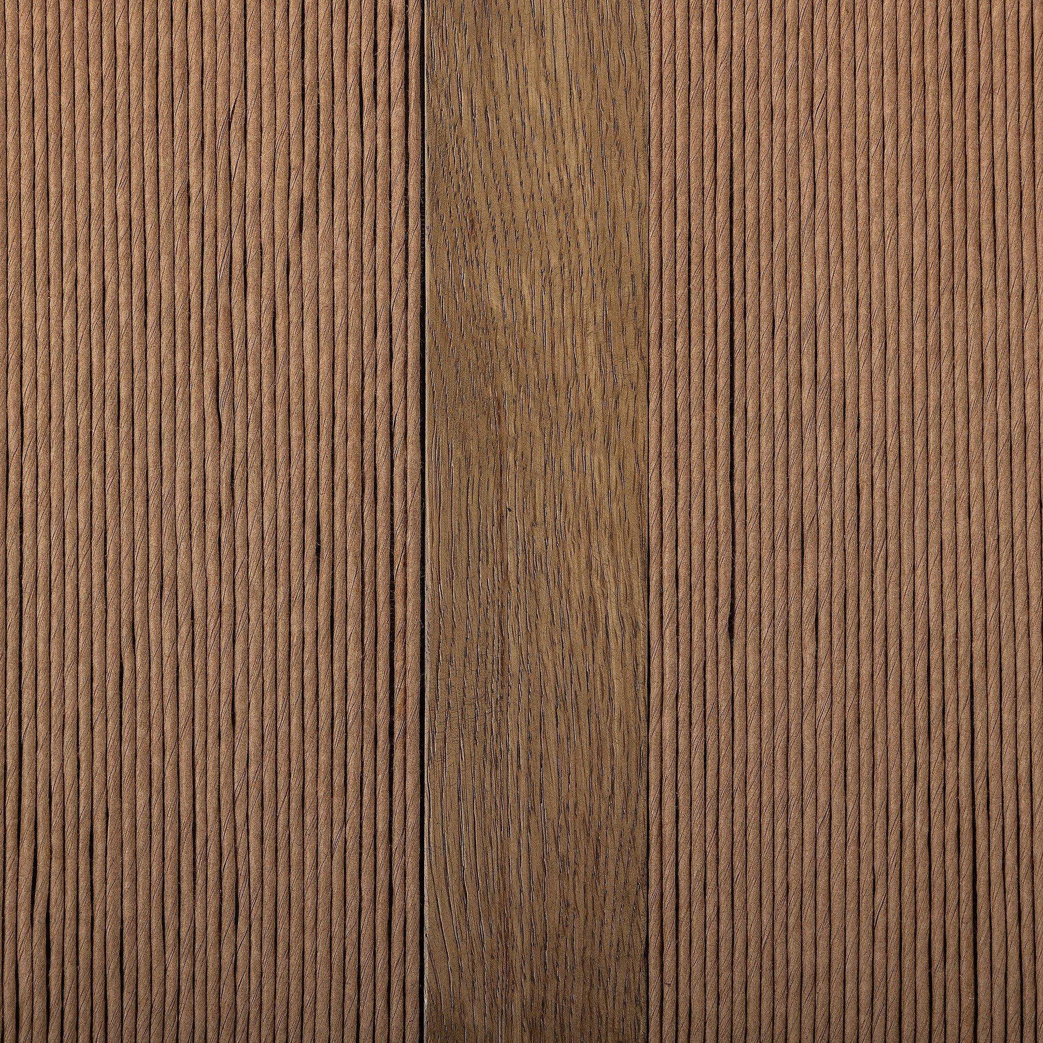 Close up of a wooden dining arm chair with woven backrest and white cushion on a white background.