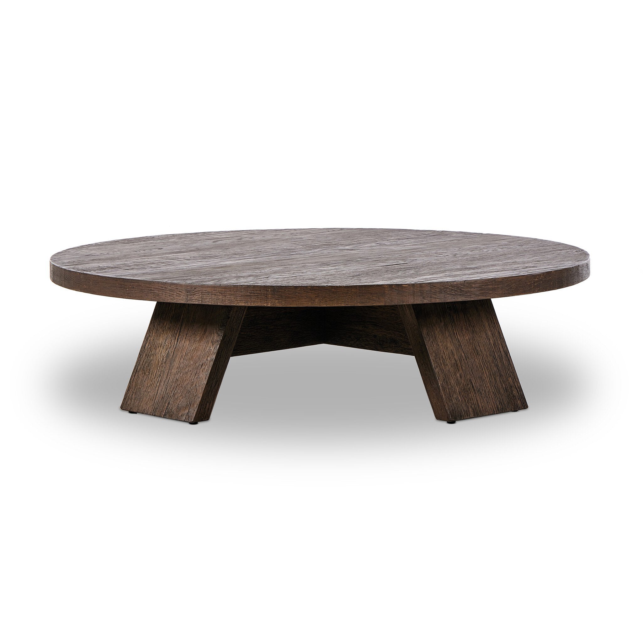 Round wooden coffee table on a white background.