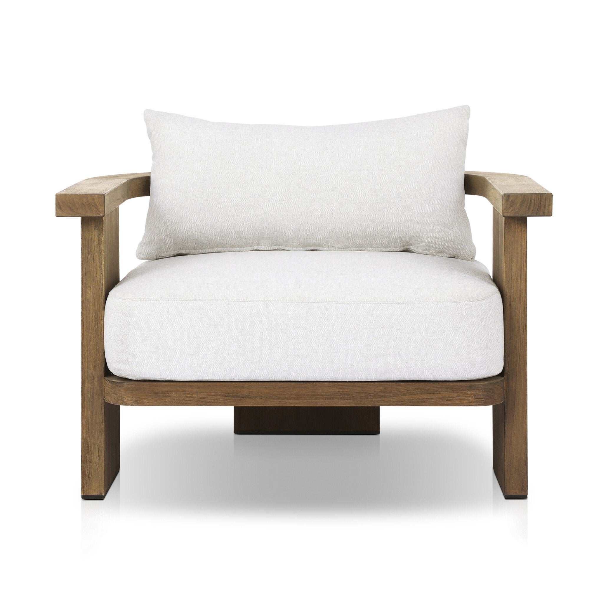 Outdoor armchair with a curved wooden frame out of teak and white linen cushions on a white background.