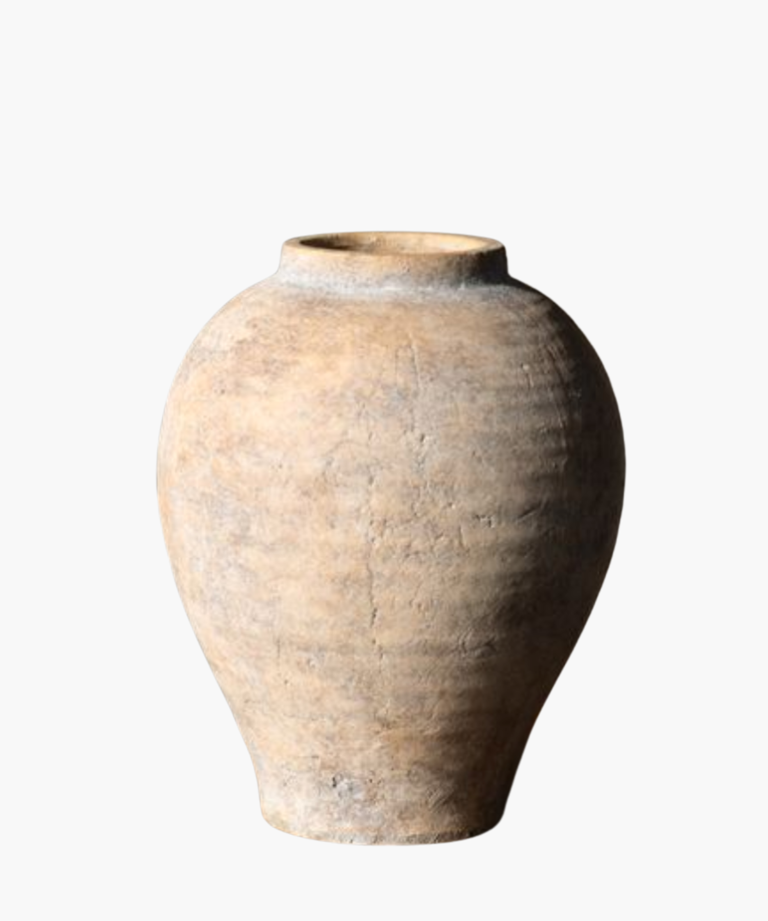 Antique clay vase with an earthy texture and rounded shape, showing signs of aging. The surface has a rustic, weathered appearance.