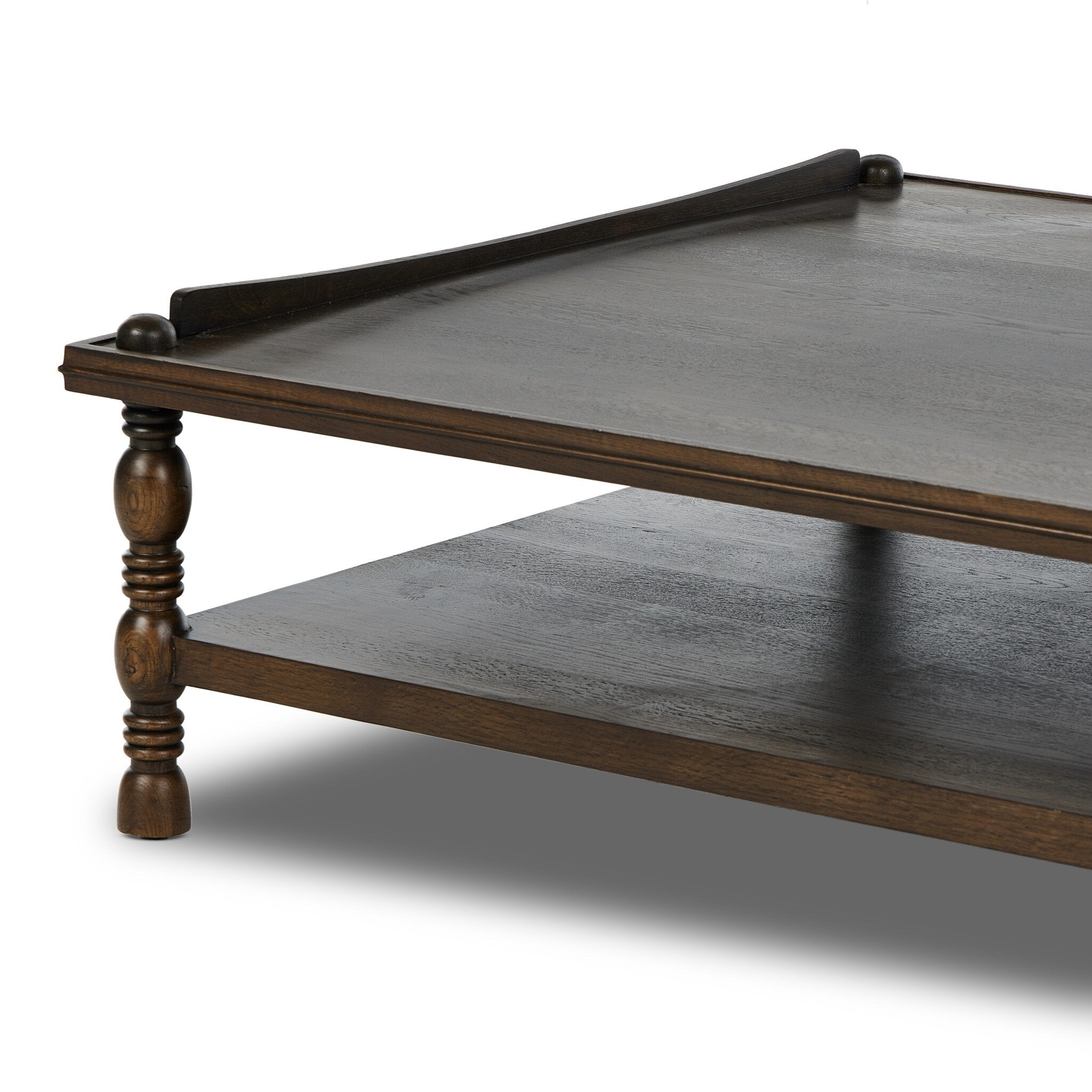 Wooden coffee table with a dark finish on a white background