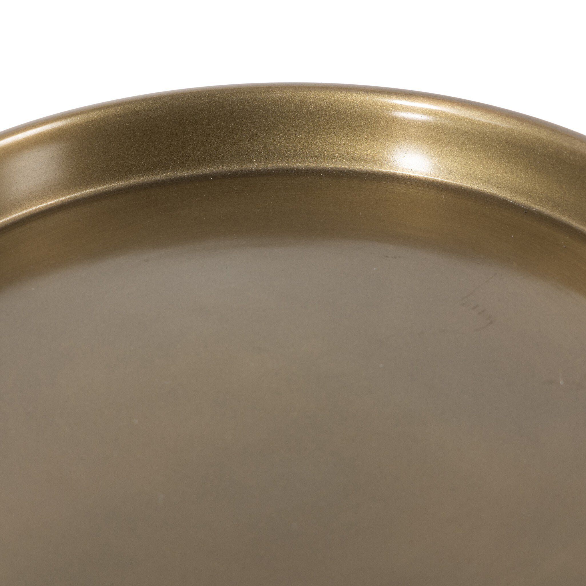 Close up view of a solid brass end table with a dark matte finish with a tray style top on a white background.