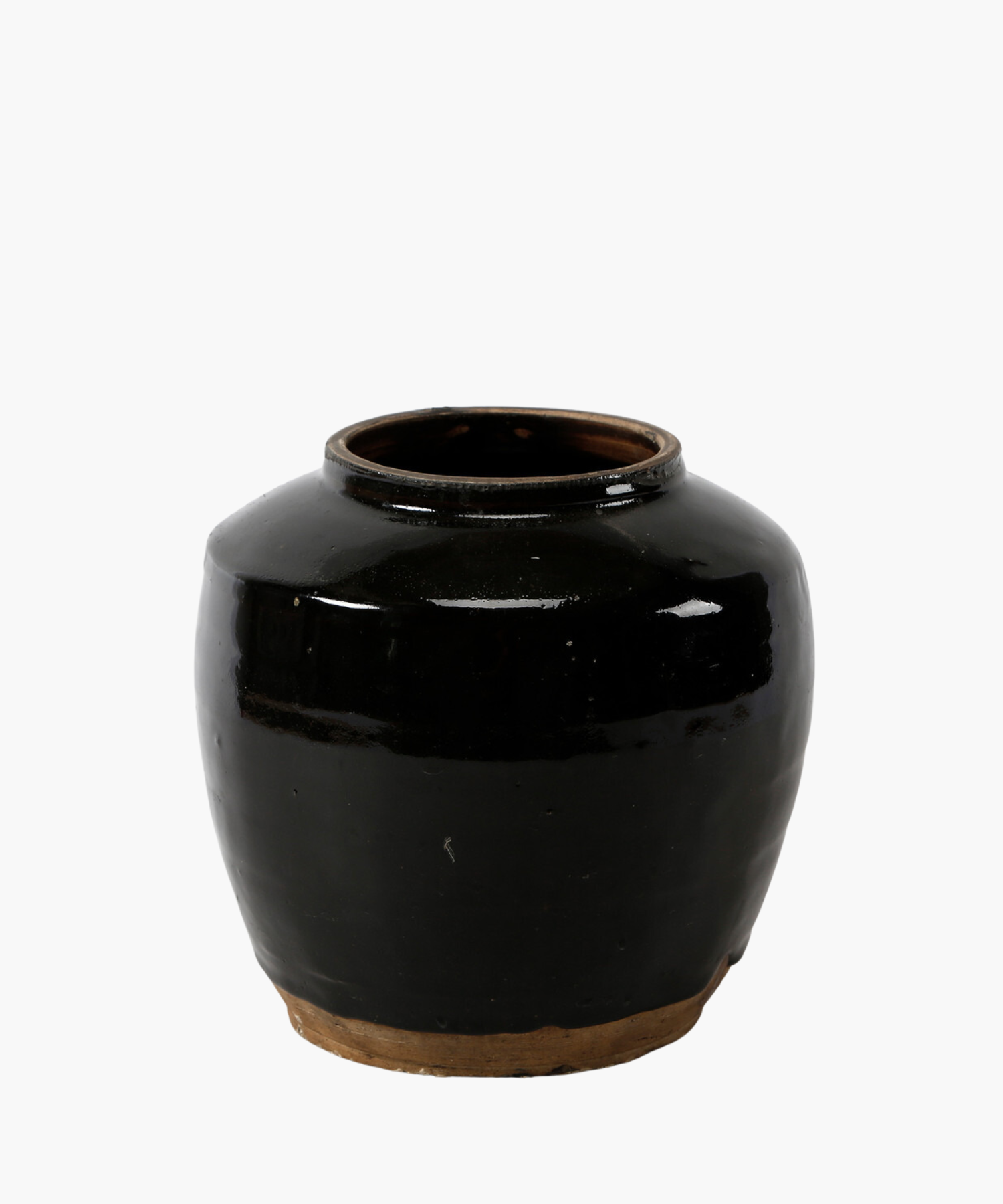 A ceramic one of a kind vintage oil pot with black glaze with a rounded body and a small opening at the top, conveying a classic and elegant tone.