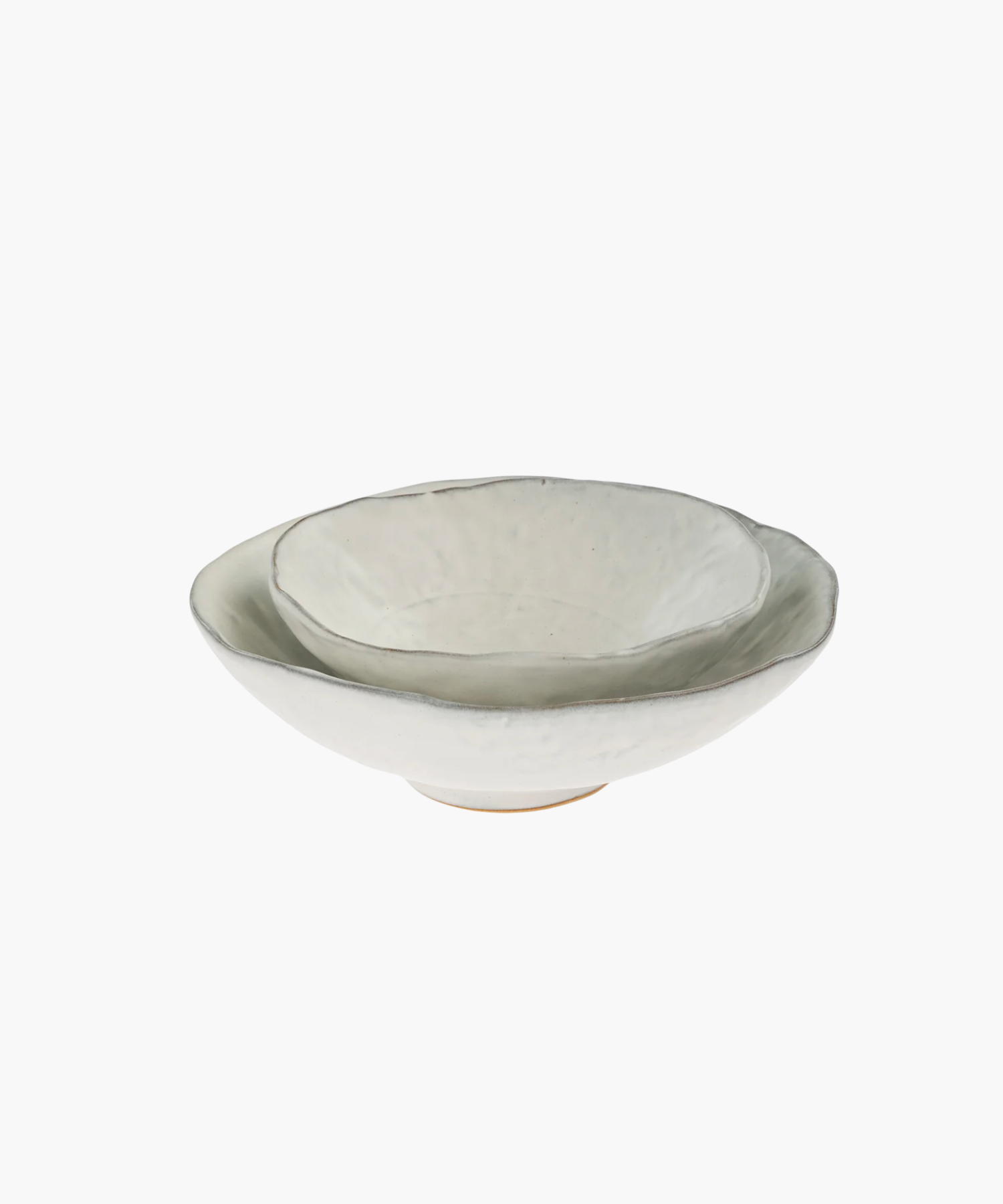 A neutral tone ceramic bowls with an organic, uneven rim and textured surface. The bowl's simplicity and elegance convey an artisanal and minimalist design.