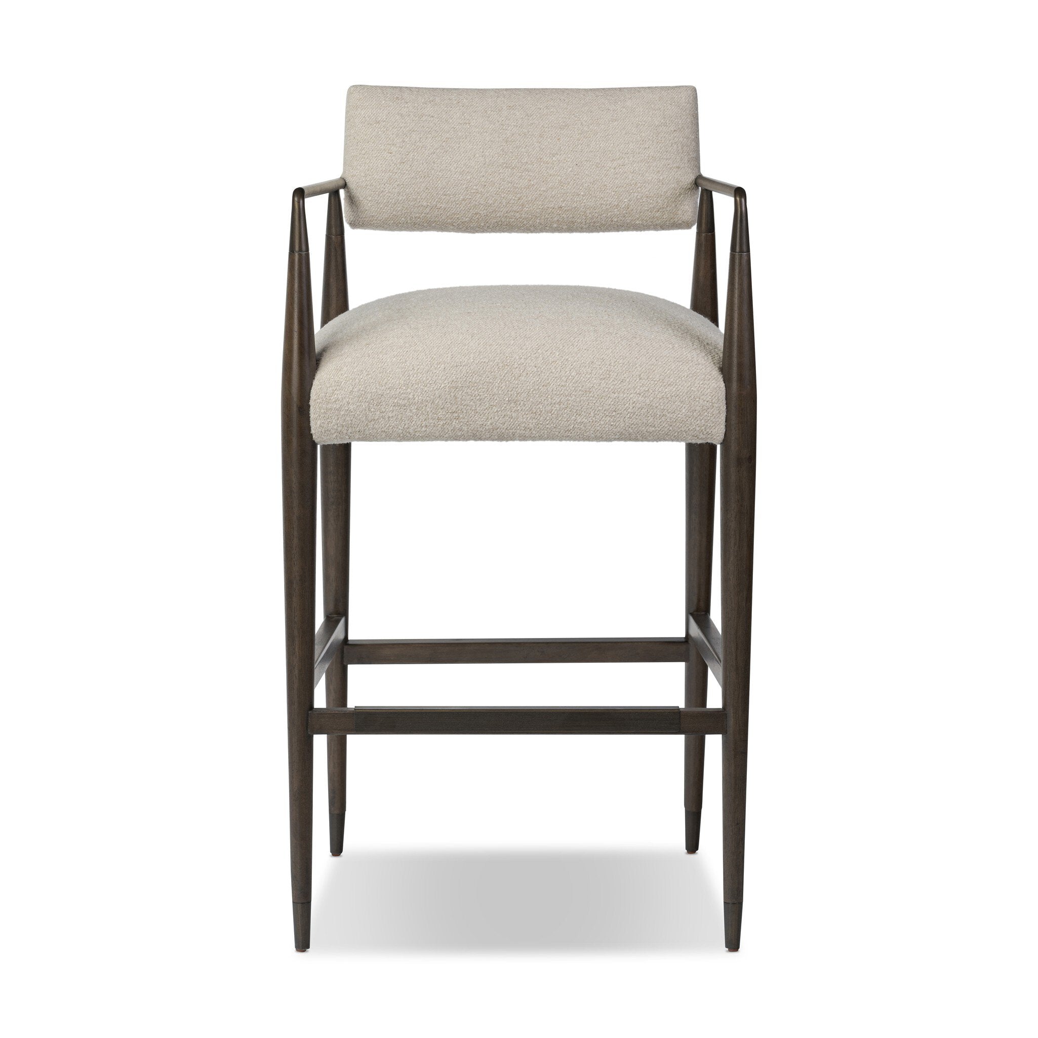 Bar stool with beige cushioned seat and backrest on a white background