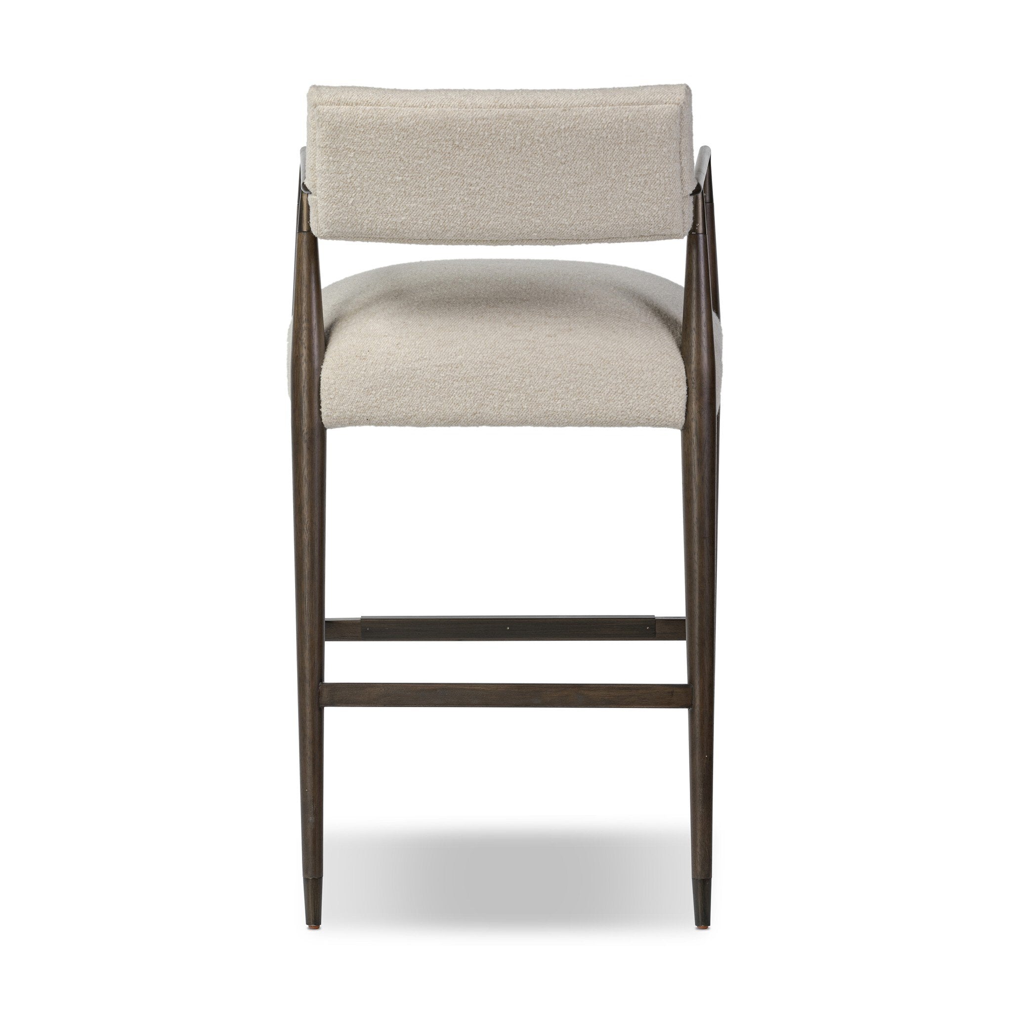 Bar stool with beige cushioned seat and backrest on a white background