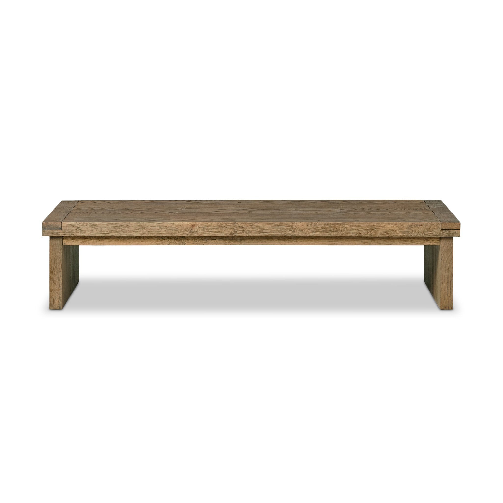 An oak coffee table on a white background.