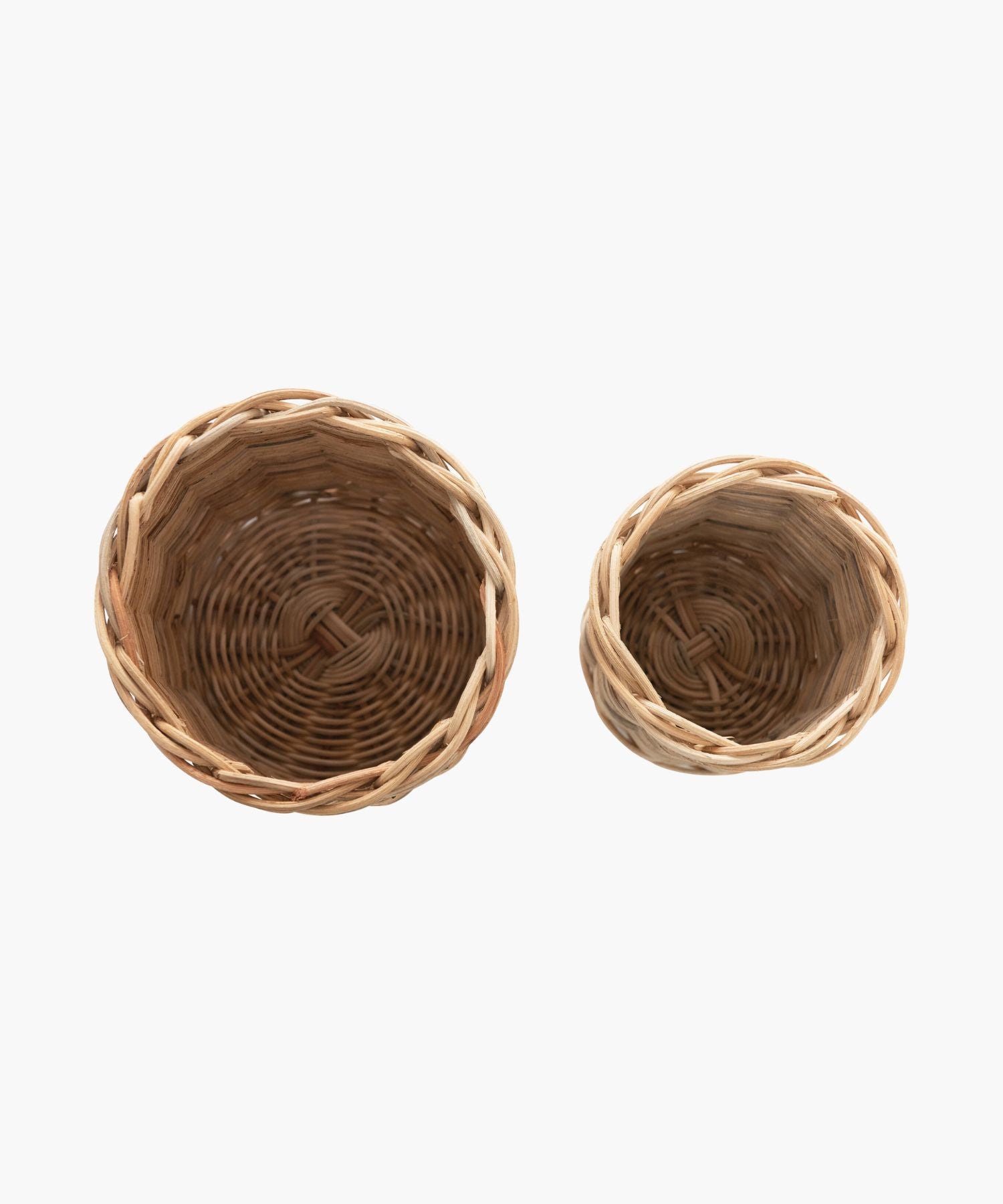 Overhead view of the hand woven wicker  basket container in 2 sizes.  Both have a natural, woven texture, evoking a rustic, cozy feel.