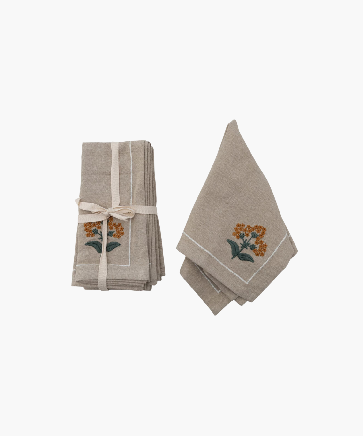 Two beige cloth napkins with orange floral embroidery. One stack is tied with a ribbon, the other folded open, suggesting elegance and simplicity.