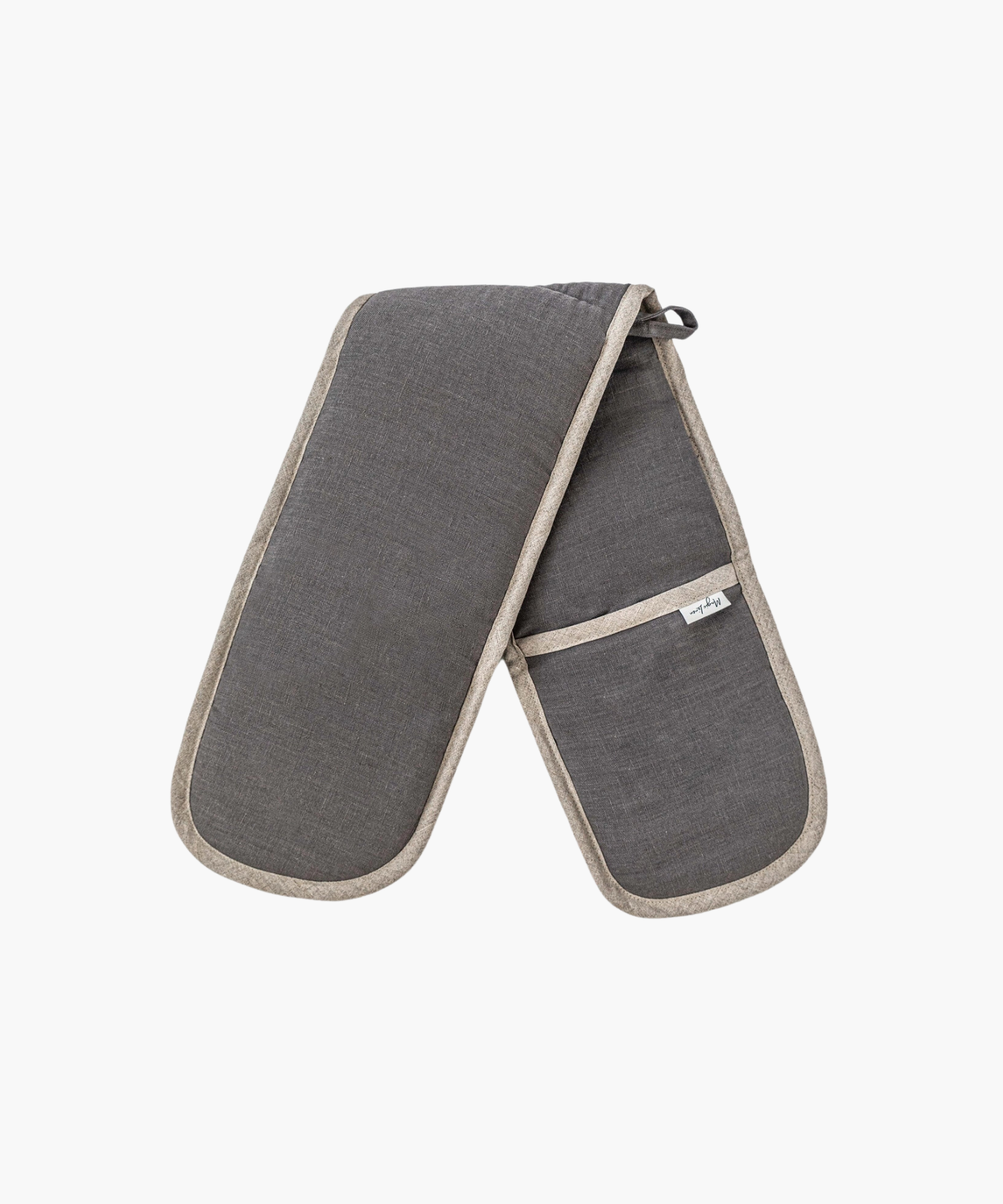 A pair of dark gray oven mitts with beige trim, linked together. They have a pocket on one side and a small loop for hanging, conveying functionality.